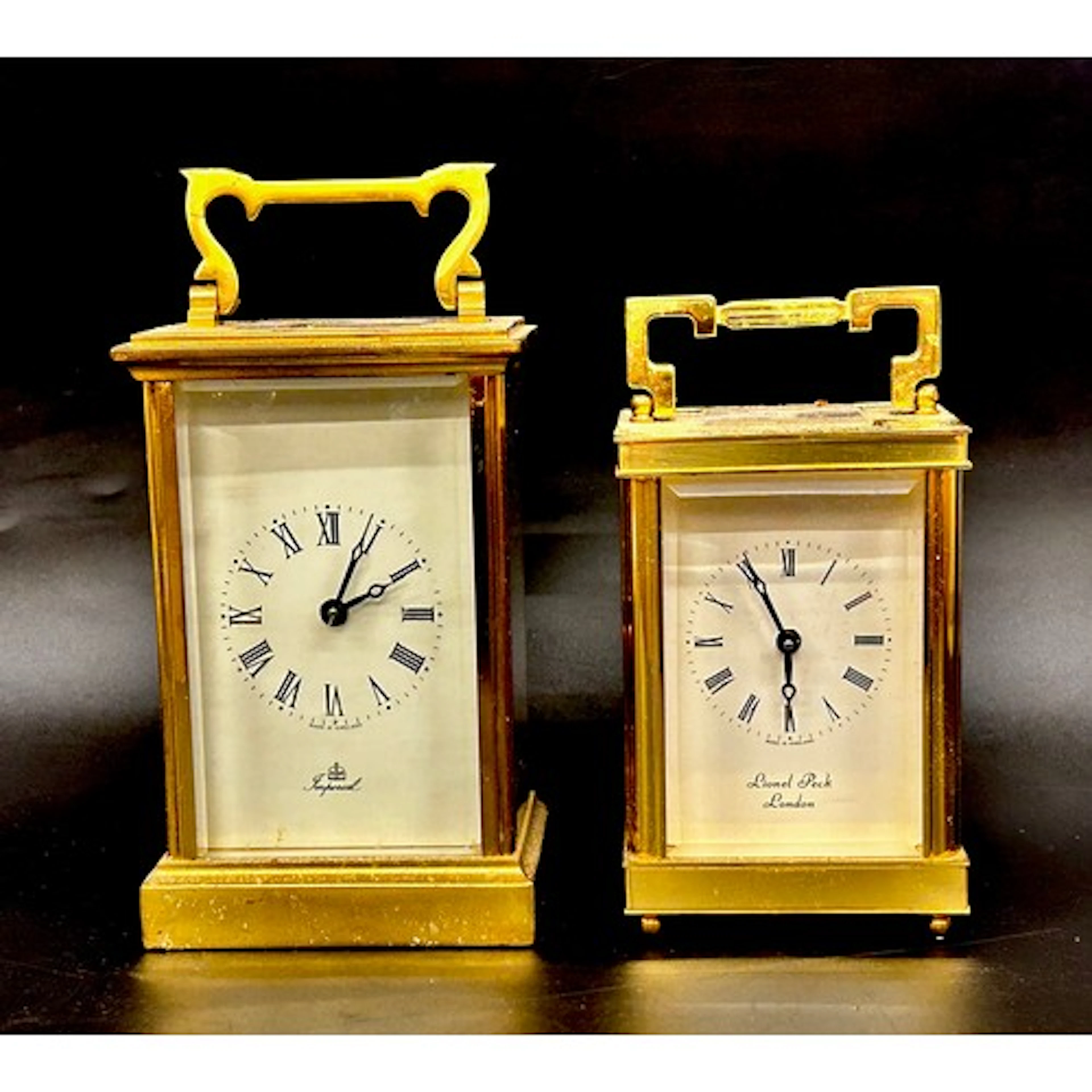 Two English brass carriage clocks, Imperial and Lionel Peck,...