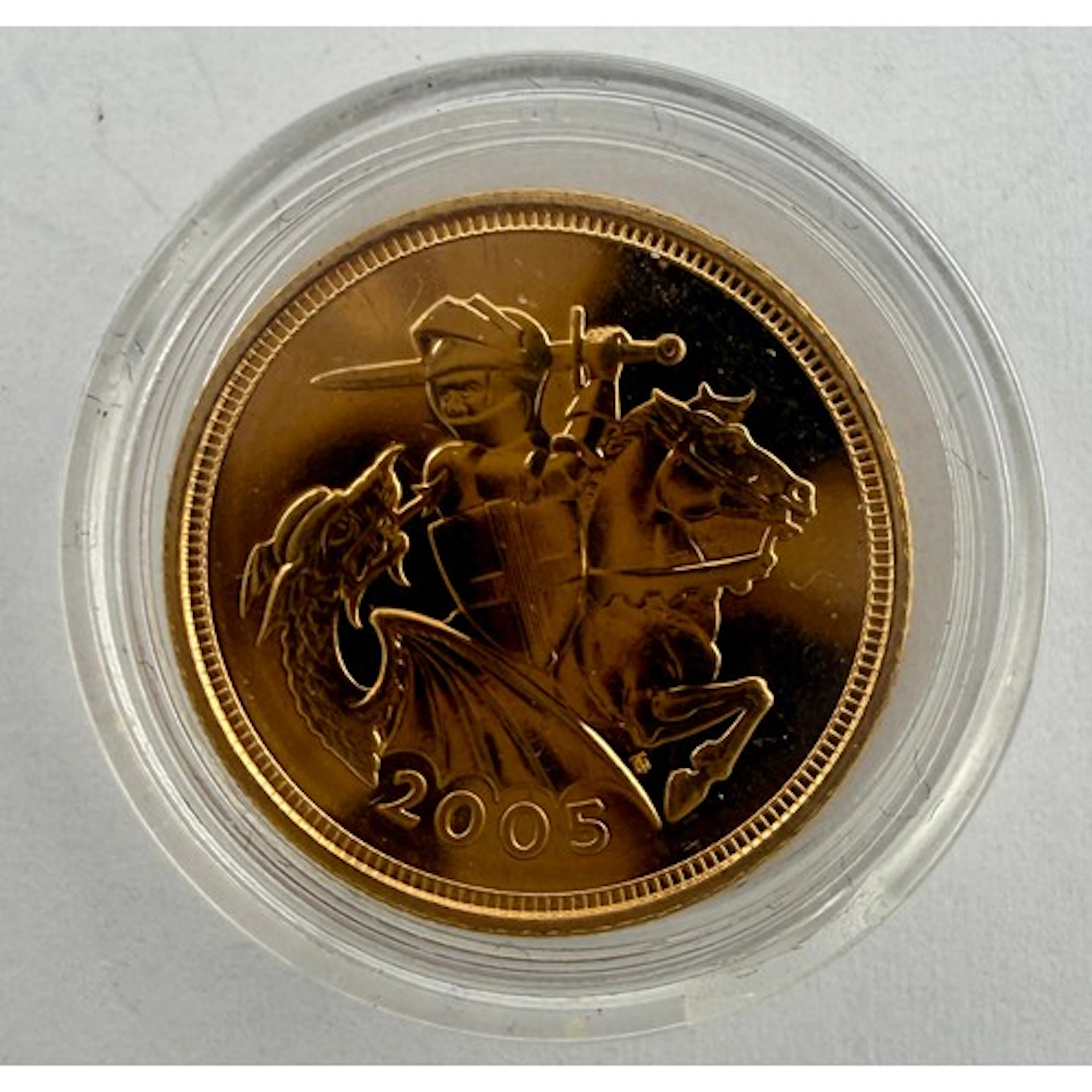 An Elizabeth II 2005 gold half sovereign.