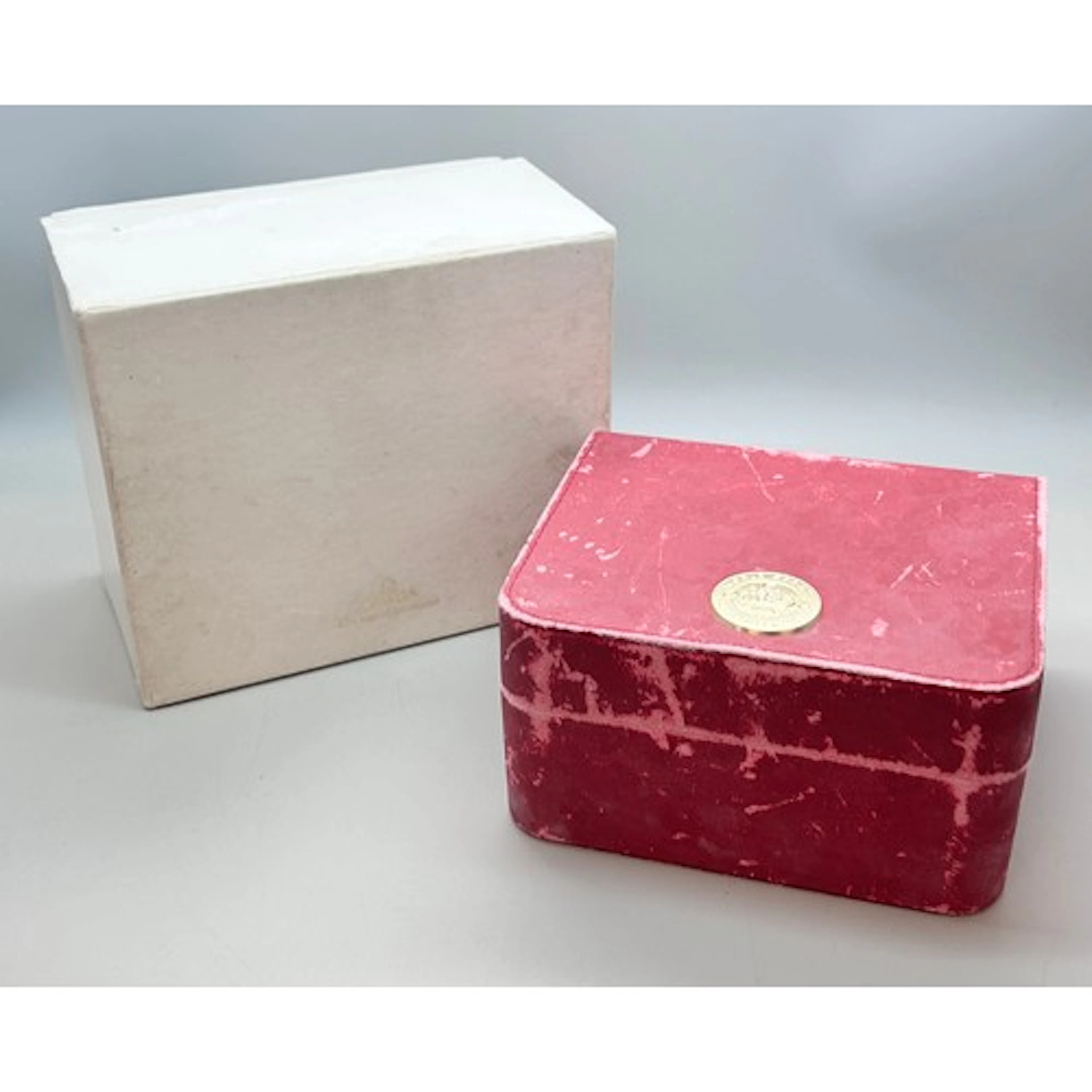 An Omega wristwatch box, with outer card box and booklets fo...