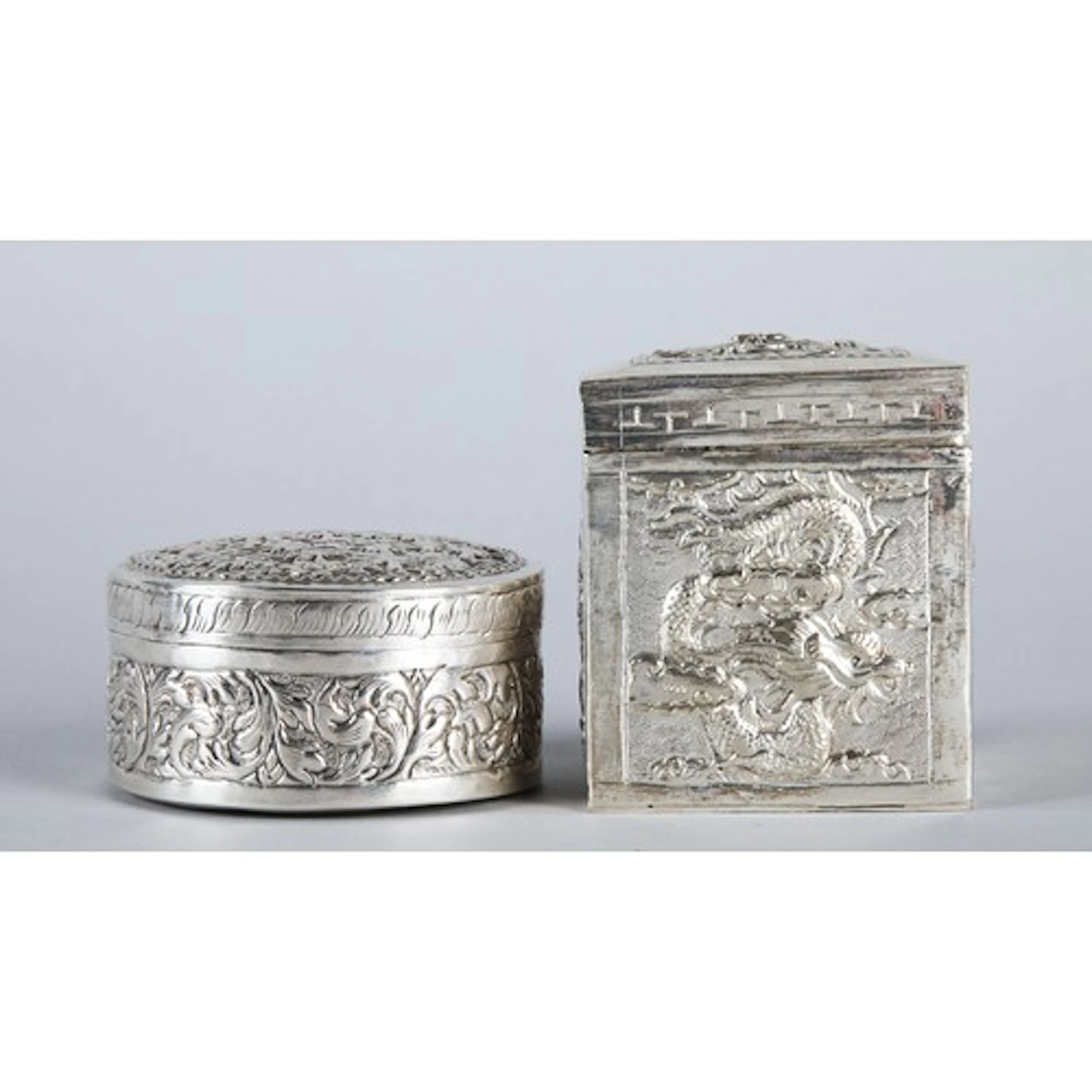 Chinese style silver coloured cylindrical box with cover, wi...