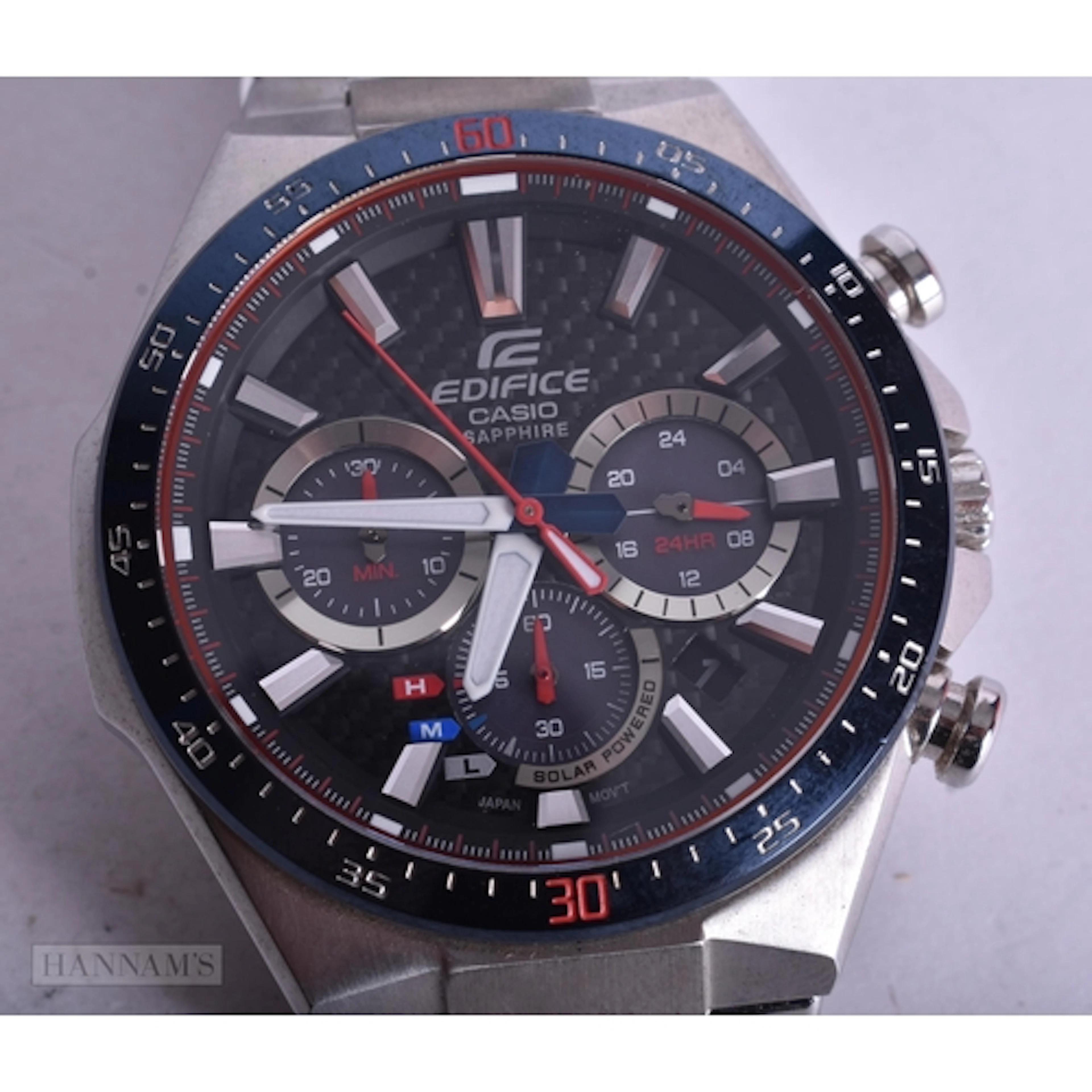 A CASIO EDIFACE WATCH. Untested. 5 cm wide.