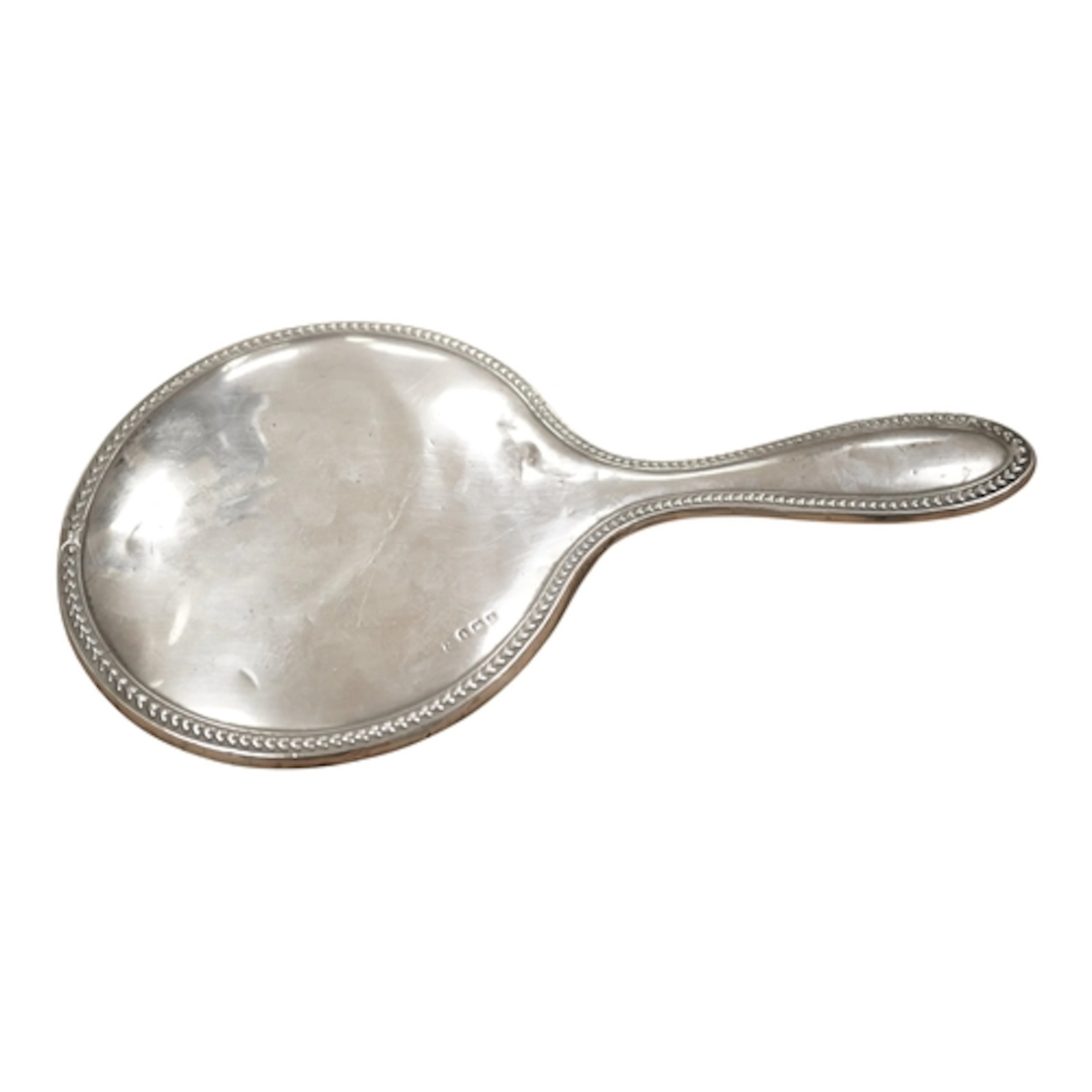 A George V silver mounted hand mirror, glass a.f, Boots Pure...