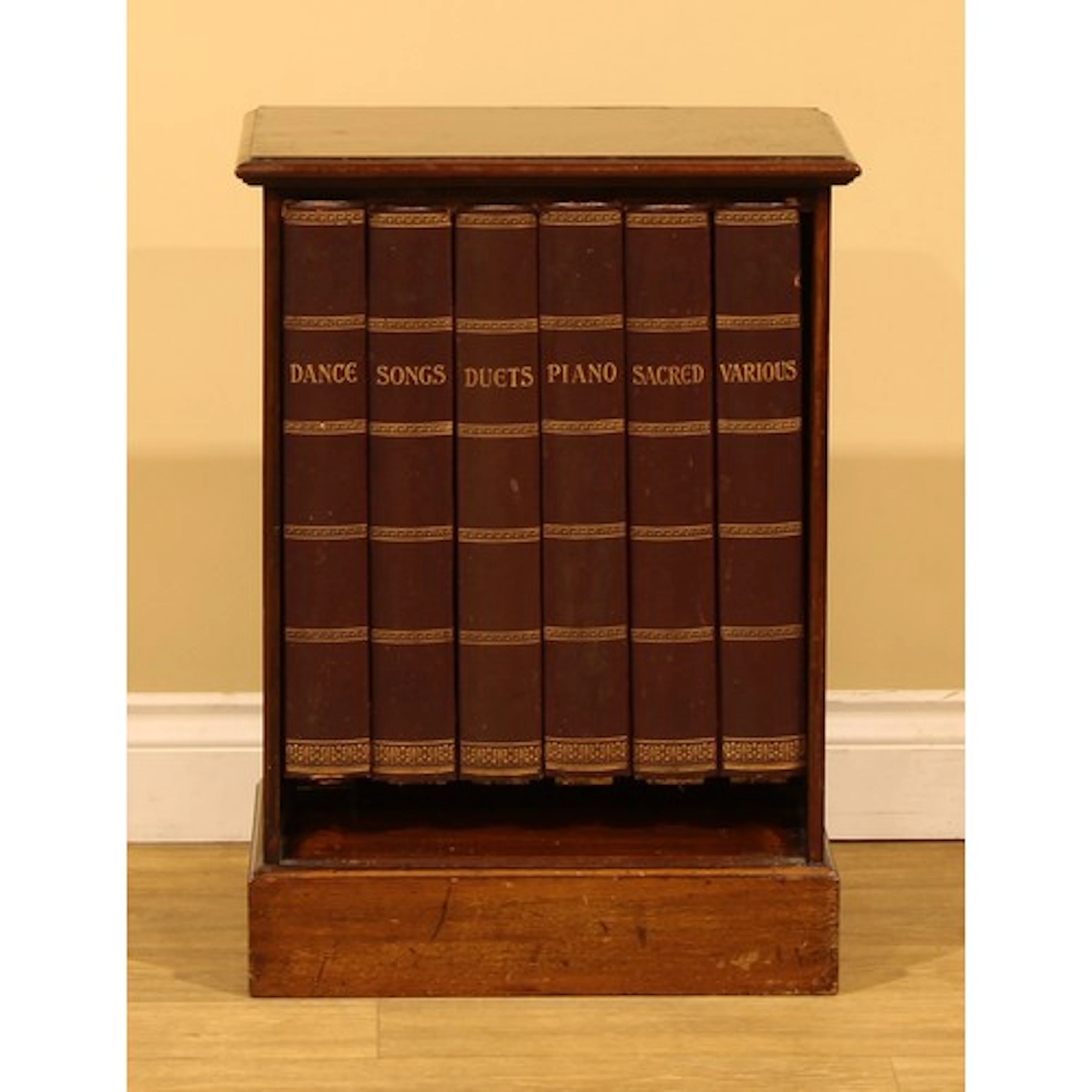 An Edwardian mahogany music room cabinet, rectangular top wi...