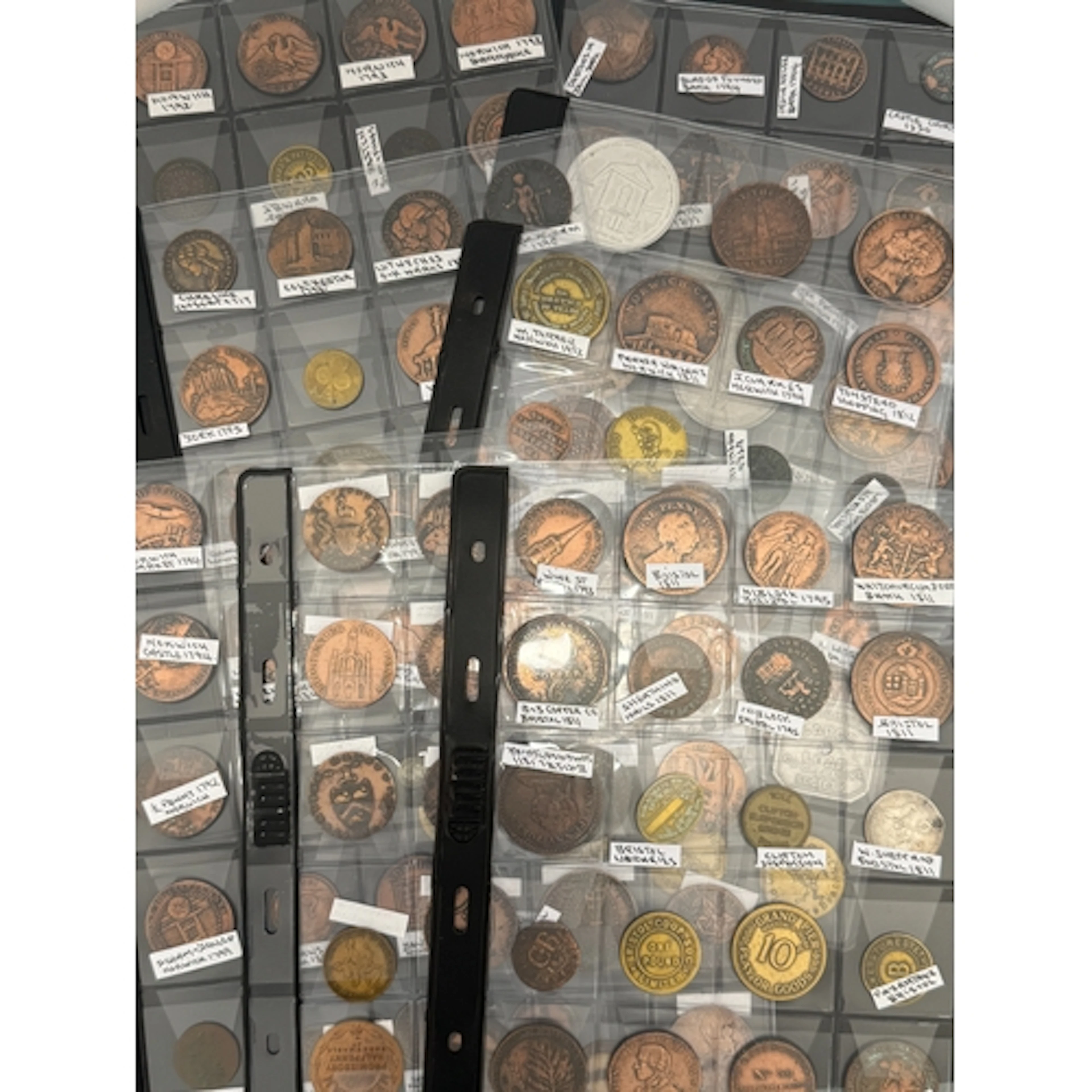 A collection of 75 mainly British tokens and medallions, dat...