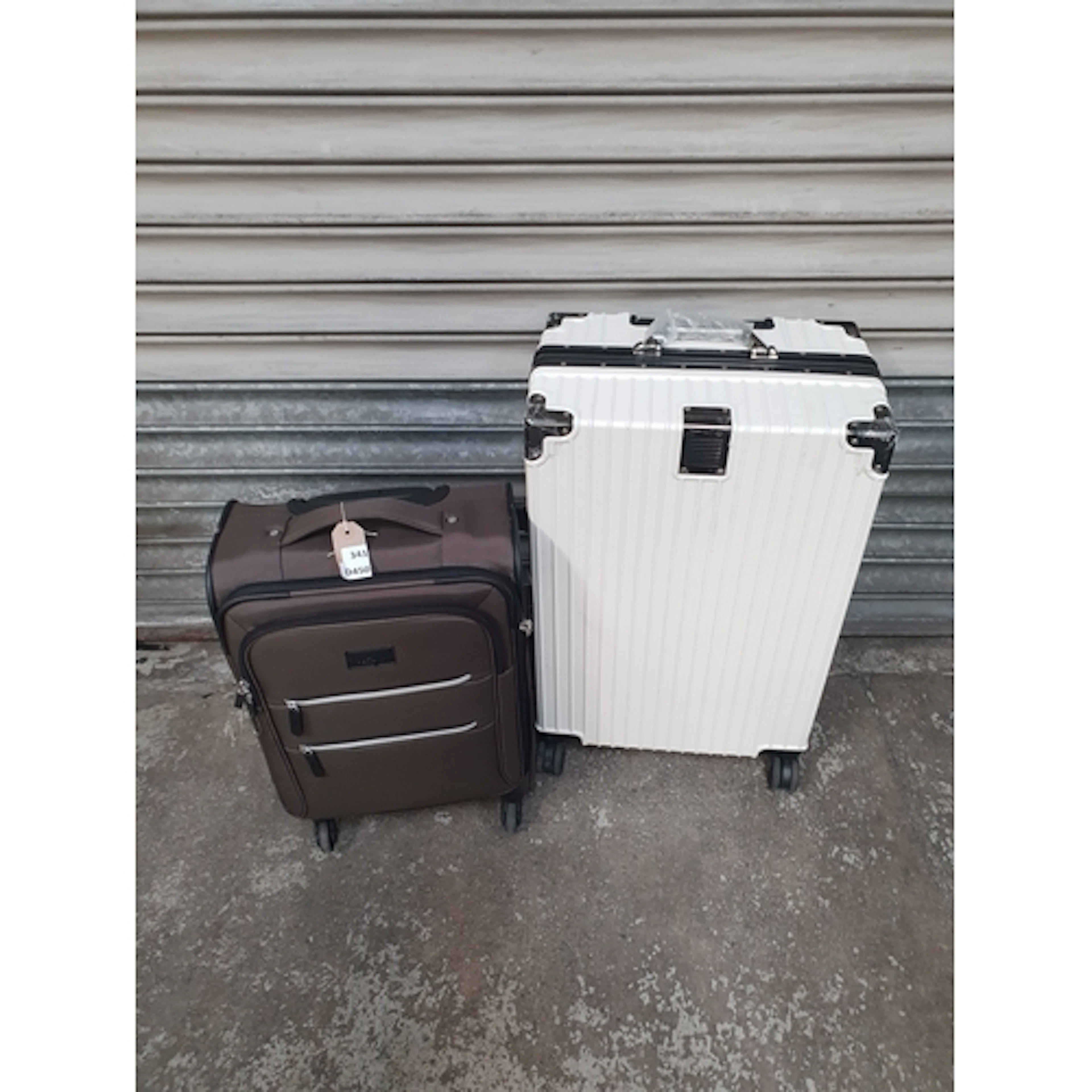 TWO SUITCASES including regent Note: cases and bags are empt...