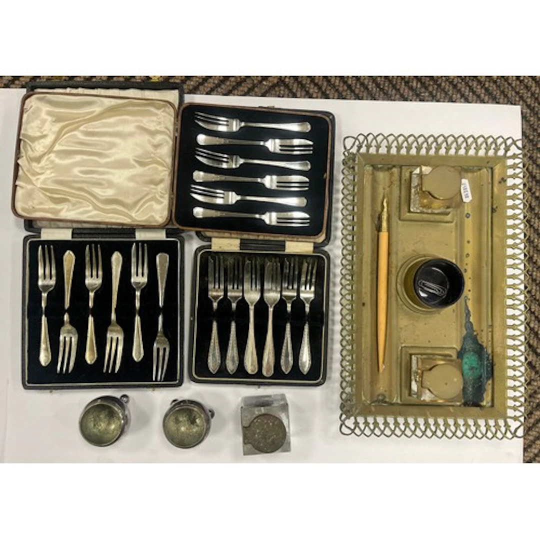 Brass inkstand, cased pastry forks, and pair of condiments.