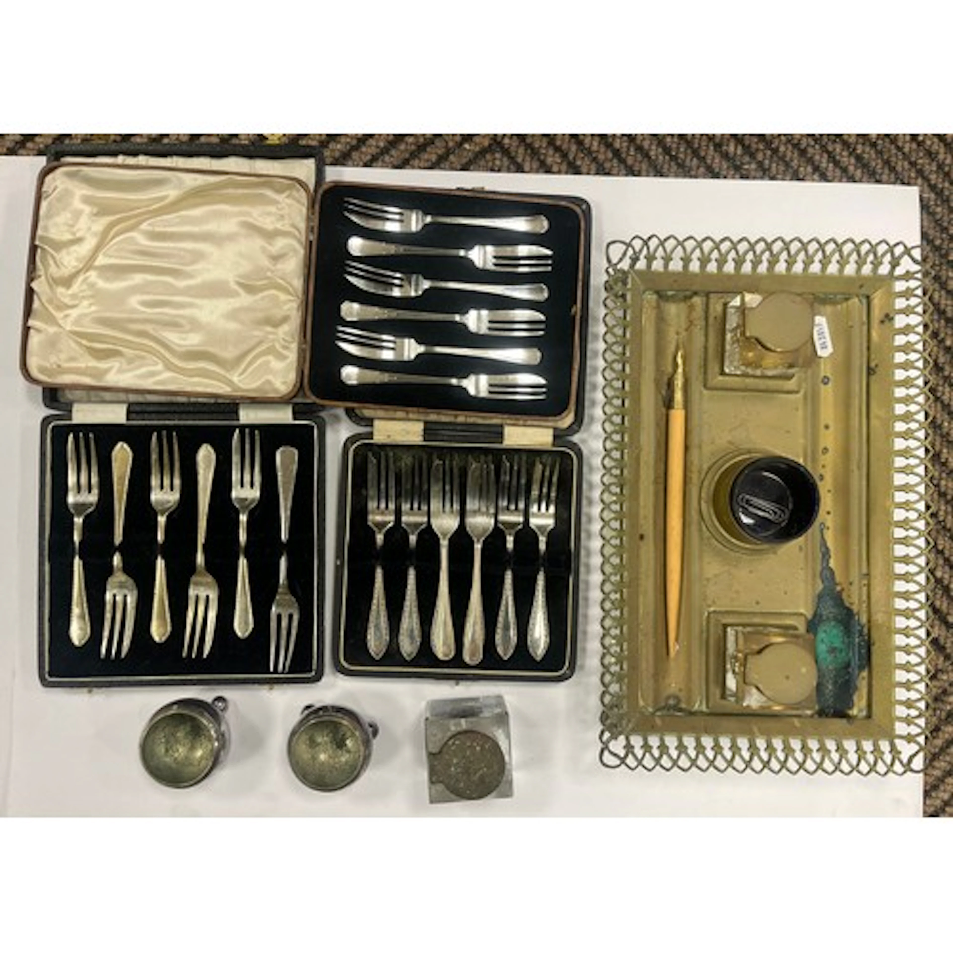 Brass inkstand, cased pastry forks, and pair of condiments.