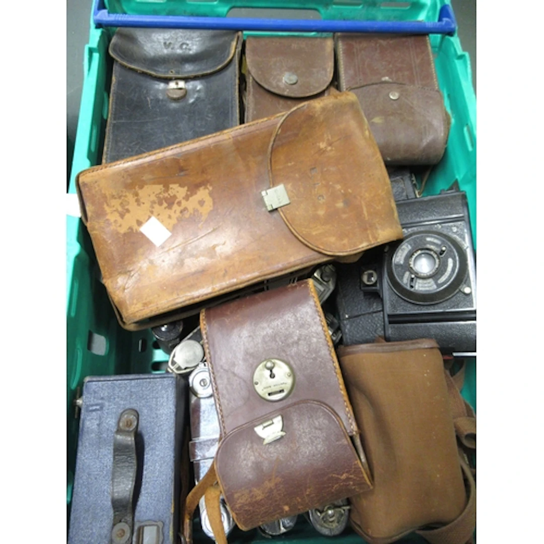 Quantity of various cameras and binoculars
