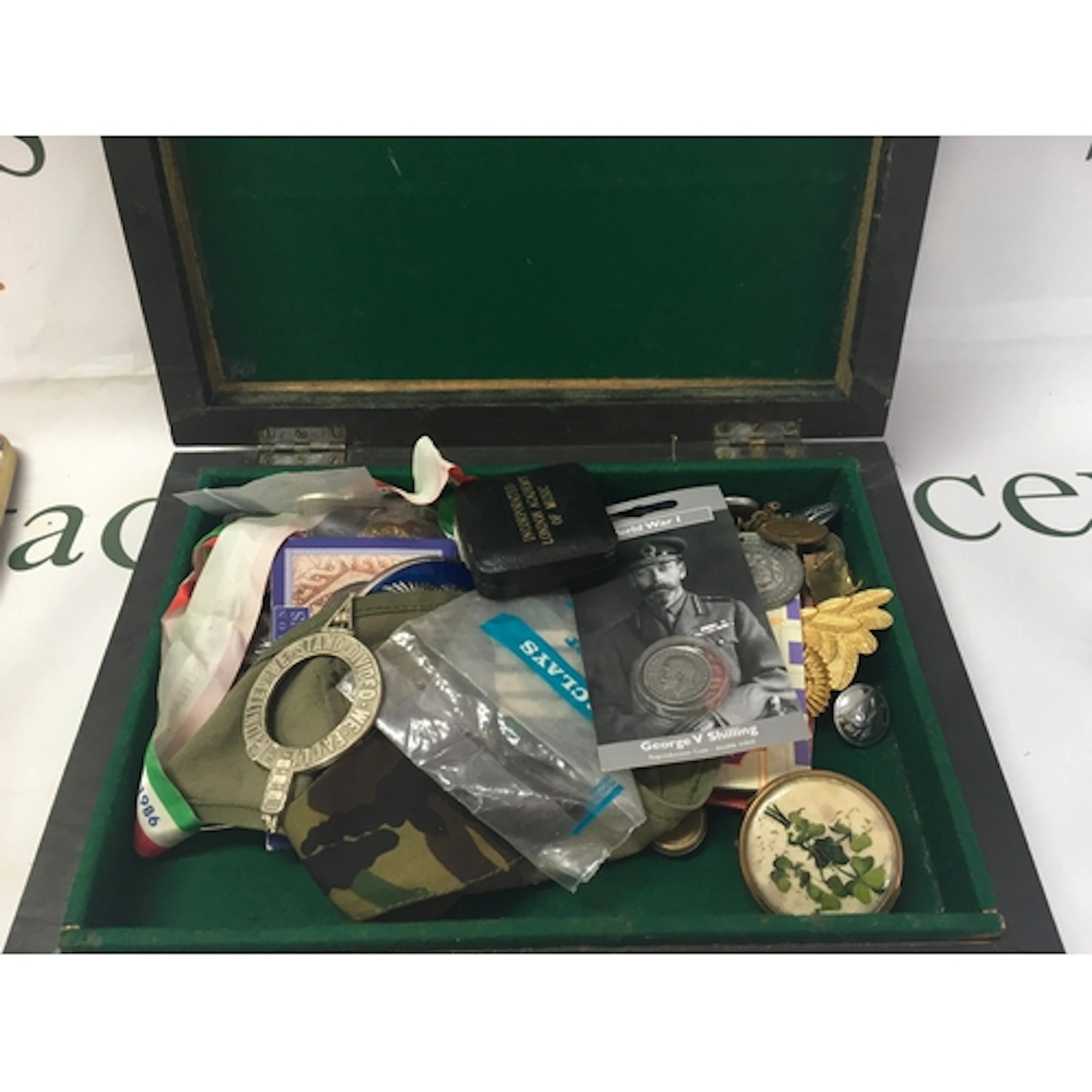 A collection of historical memorabilia, medals, tokens, and ...