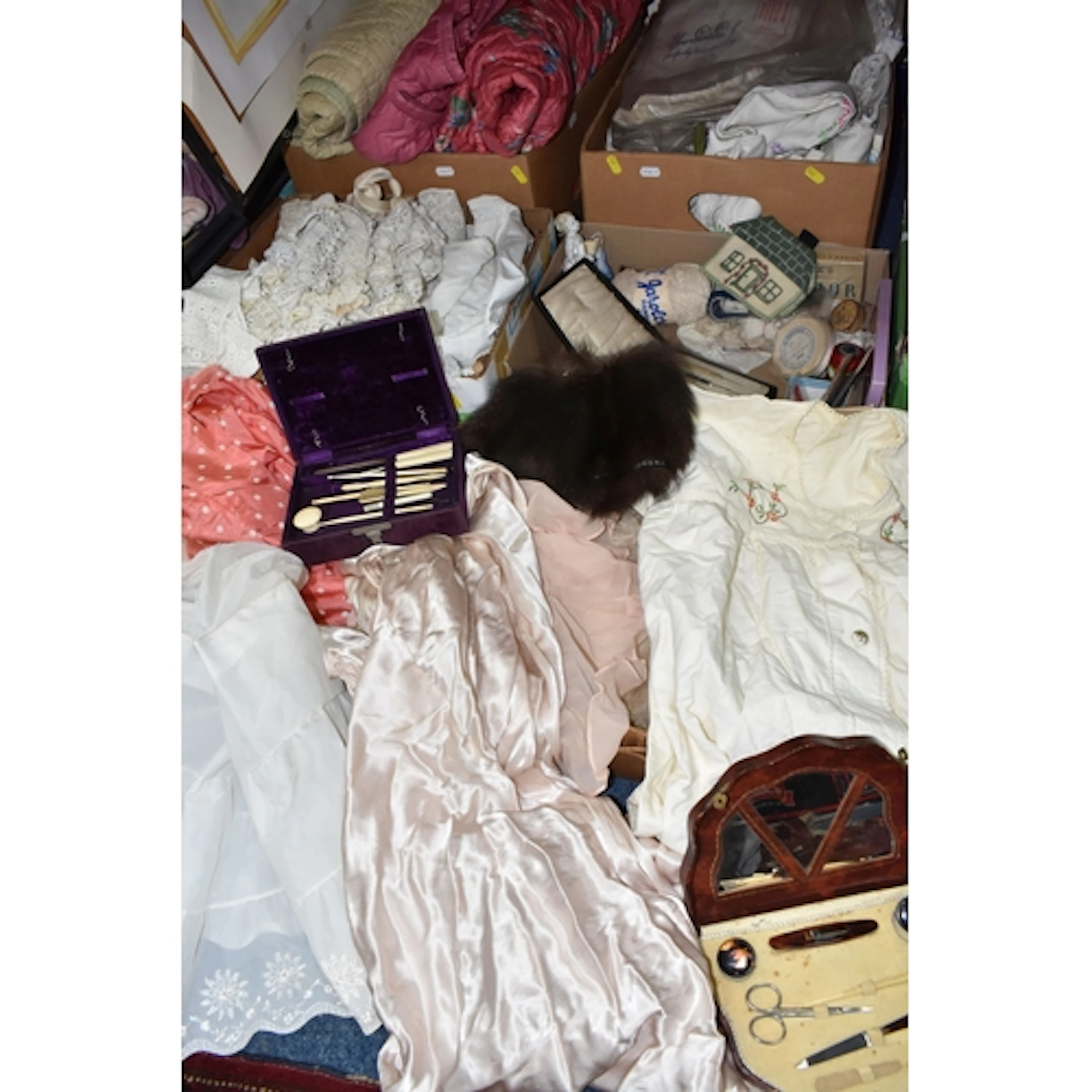 FIVE BOXES OF VINTAGE CLOTHES AND TABLE LINEN, to include me...