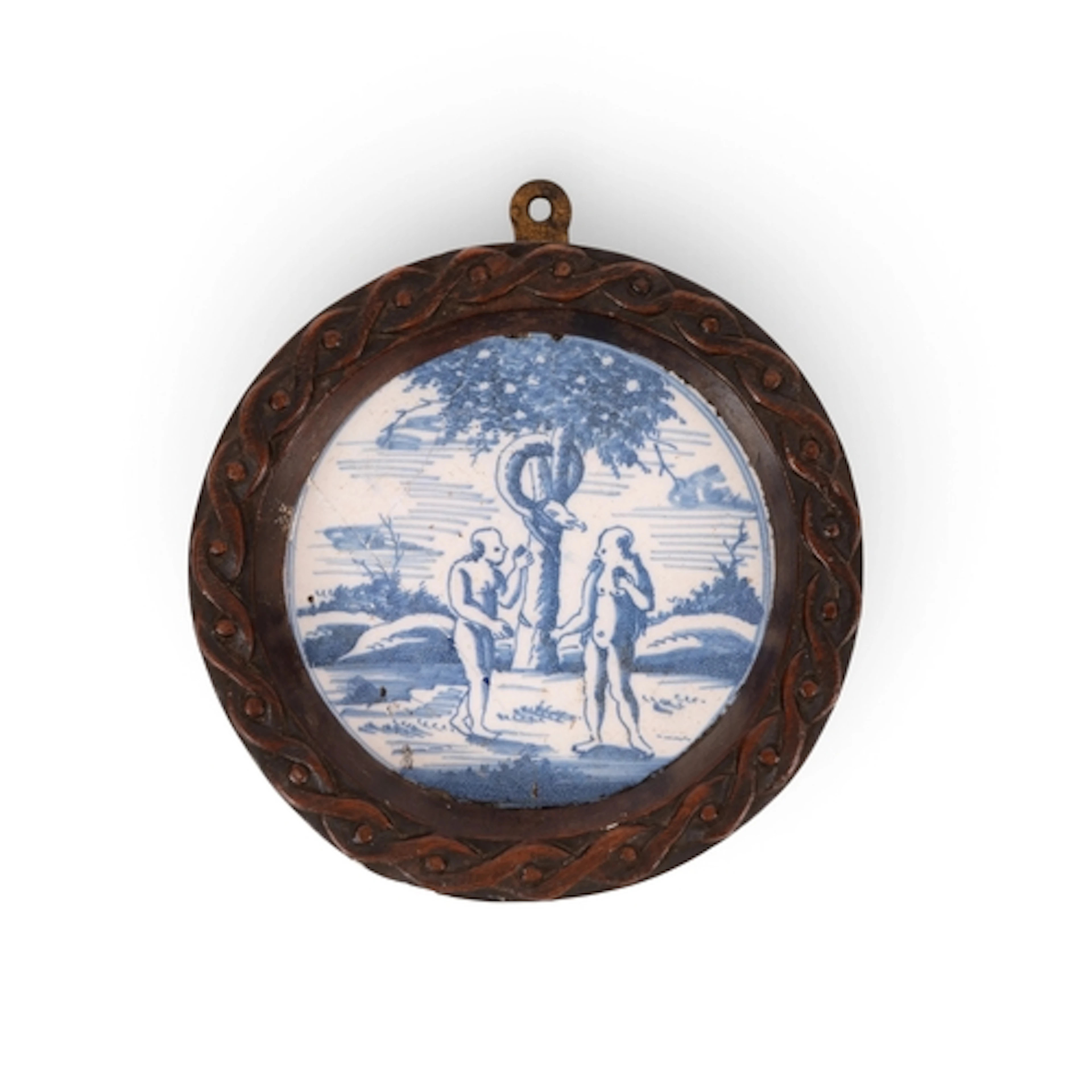 A delftware tile or plate centre, early 18th century, painte...