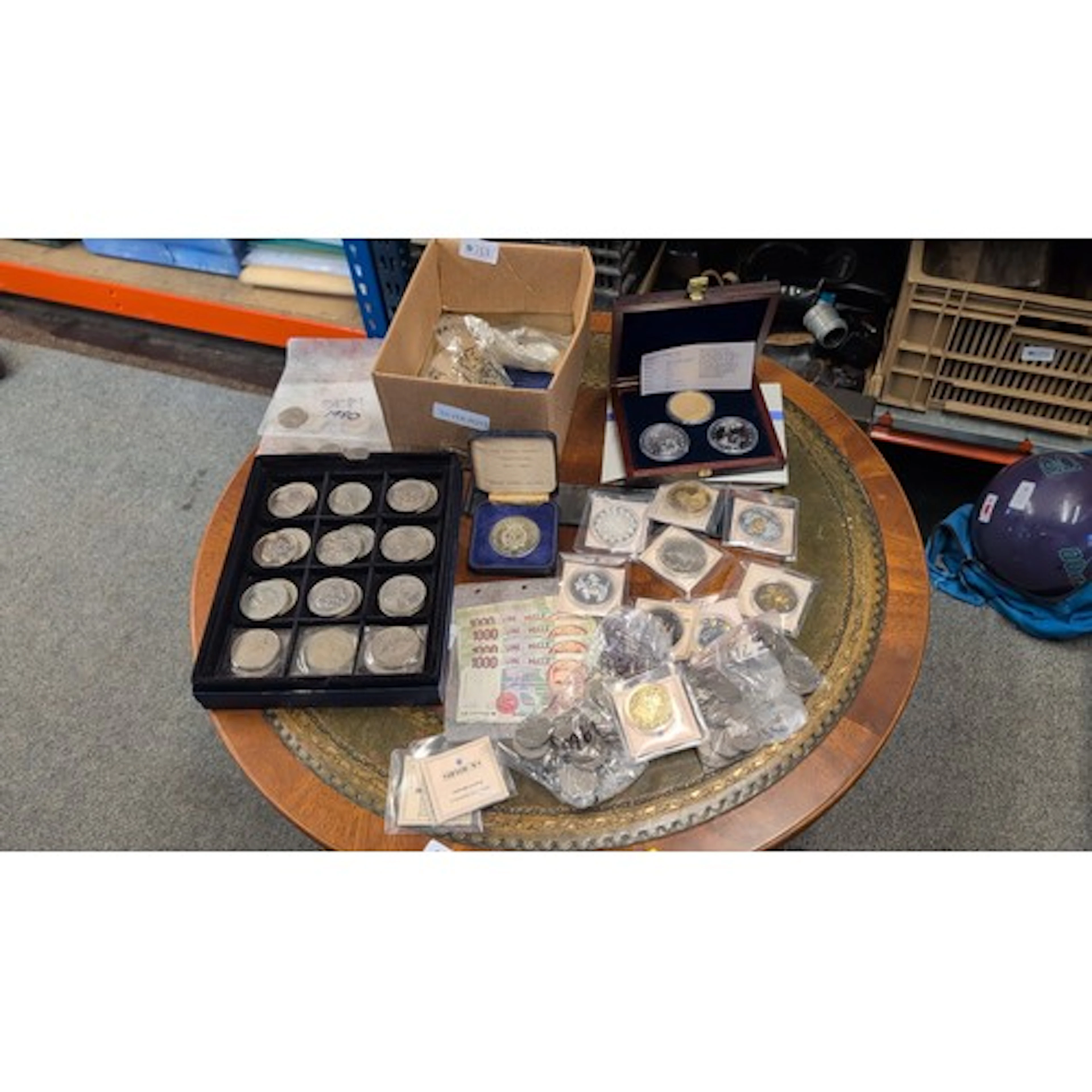 A quantity of modern commemorative and bullion-style coins a...