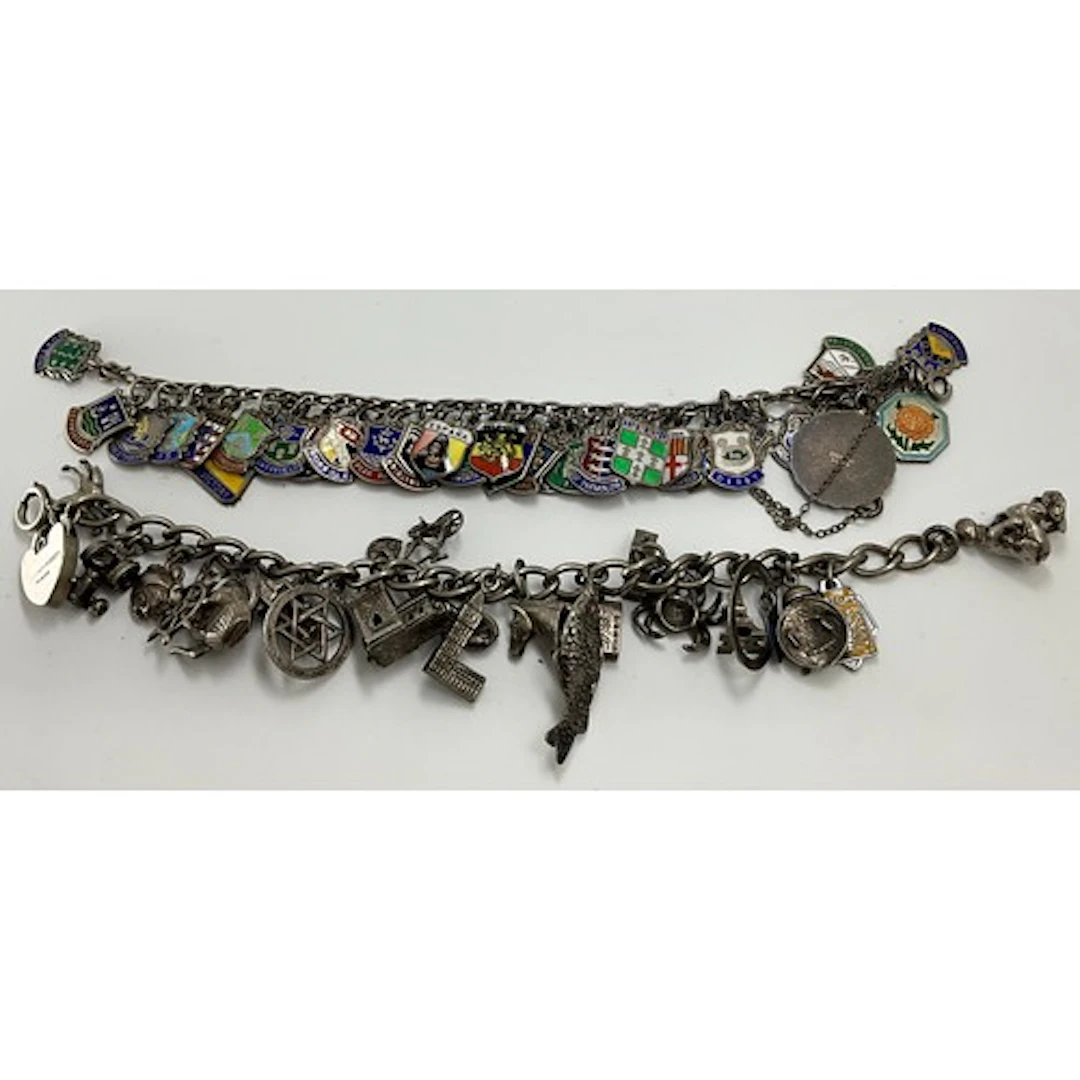 Two silver charm bracelets, 118g gross