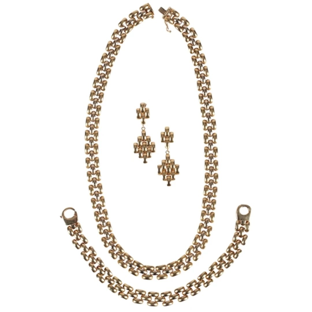 A gold parure, Italy, circa 1990, comprising: a necklace, br...