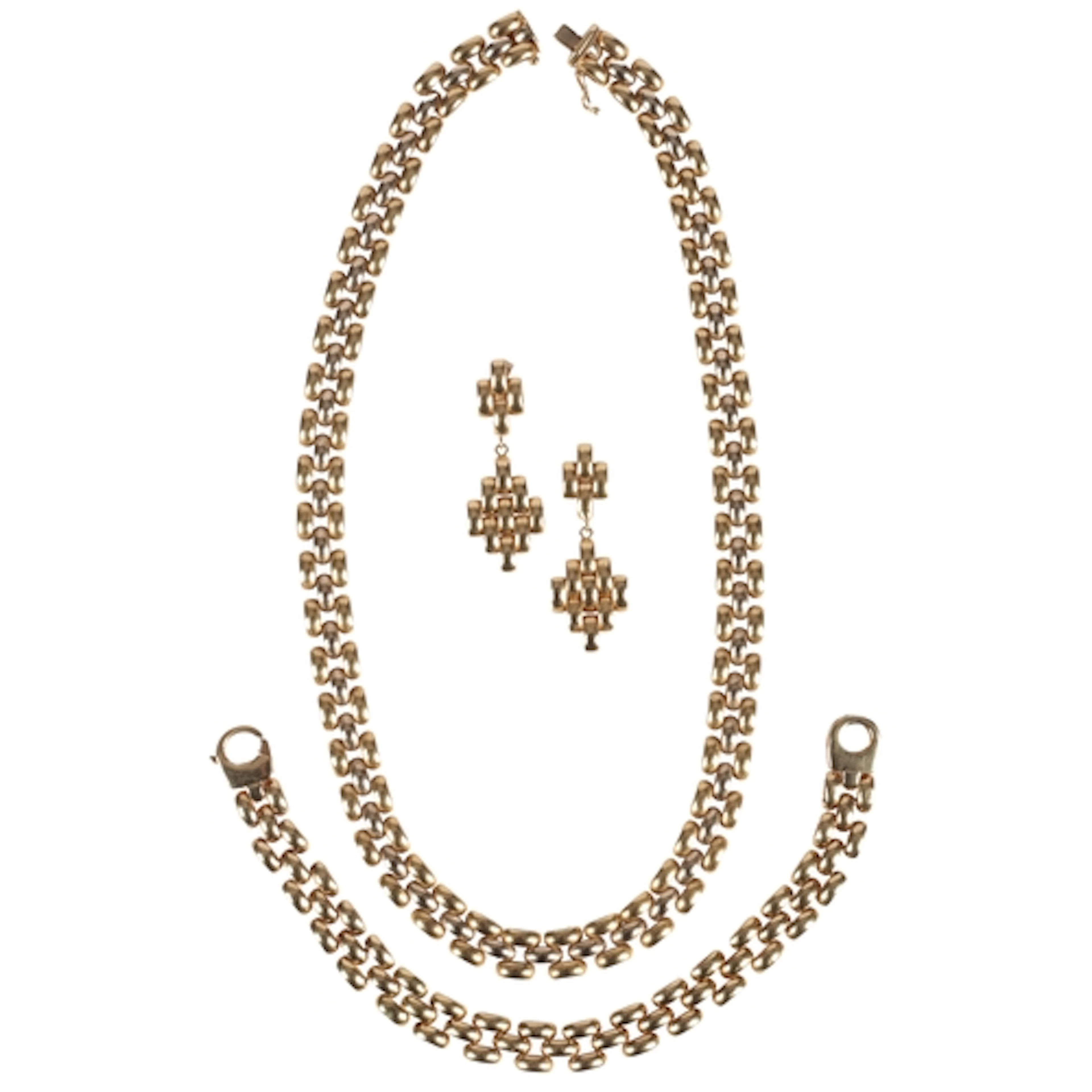 A gold parure, Italy, circa 1990, comprising: a necklace, br...