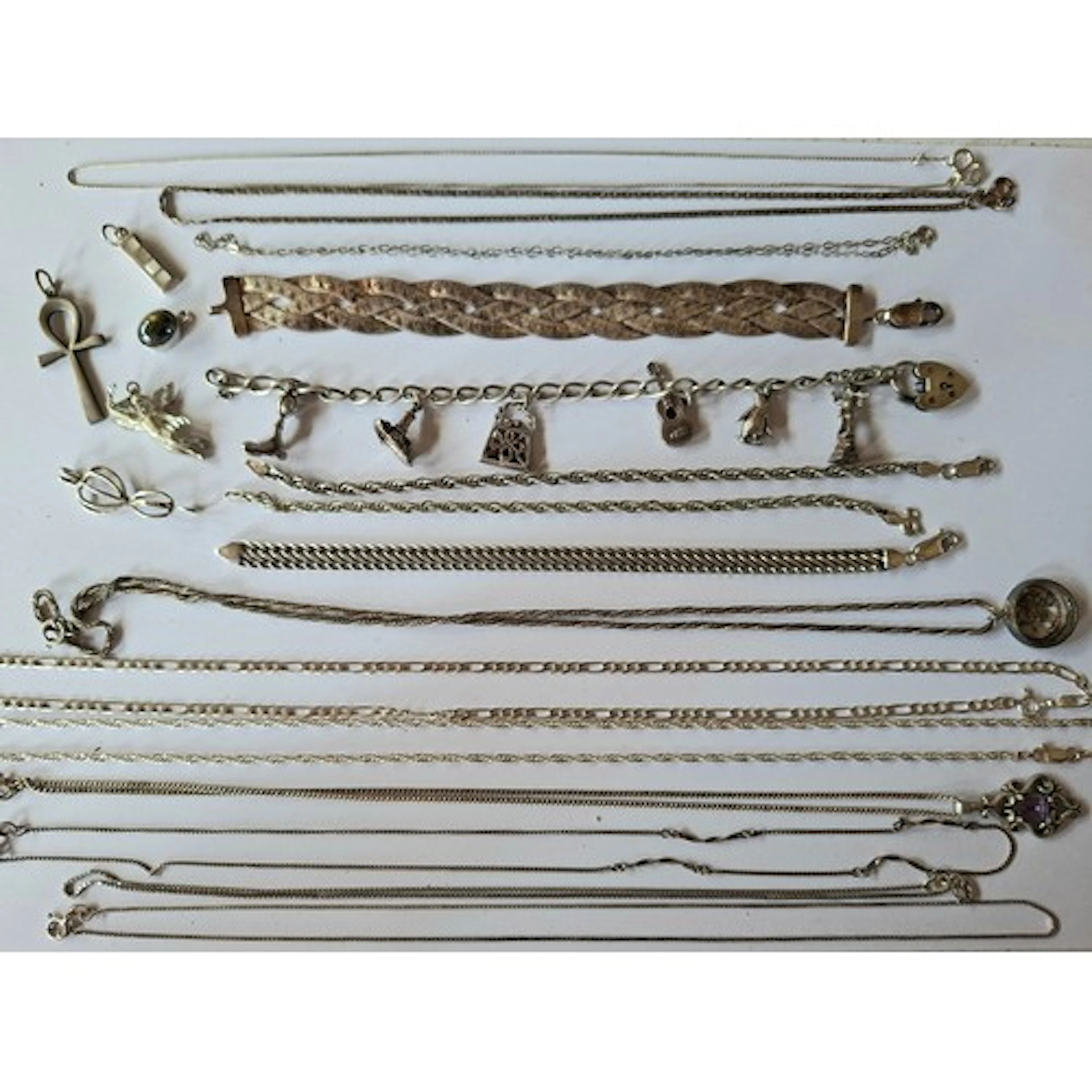 Silver chains, pendants and bracelets to include a silver Mi...