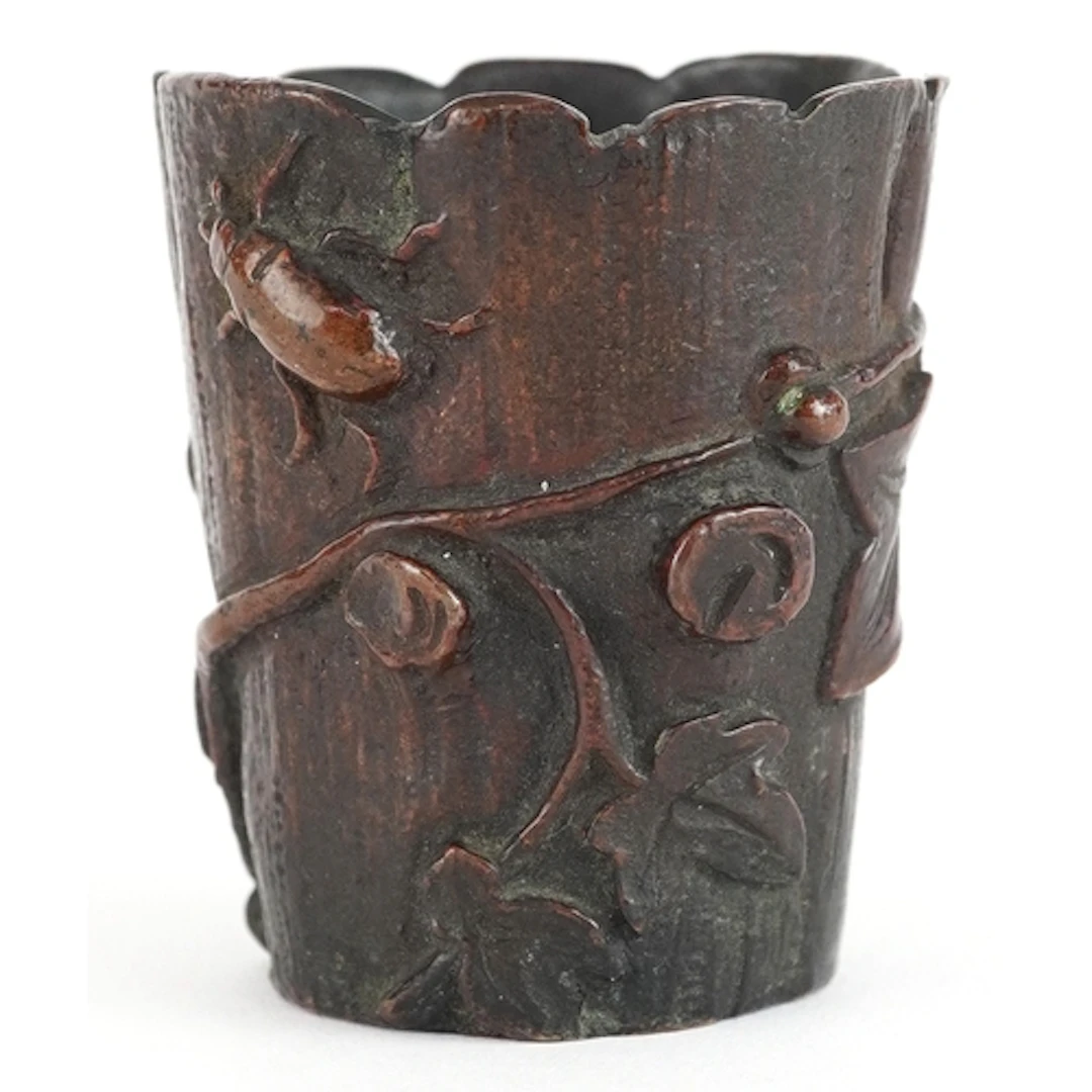 Chinese cast bronze brush pot decorated in high relief with ...