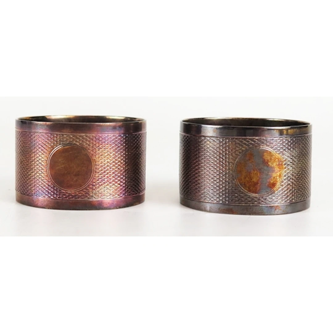 A pair of George V silver napkin rings, maker S Blanckensee ...