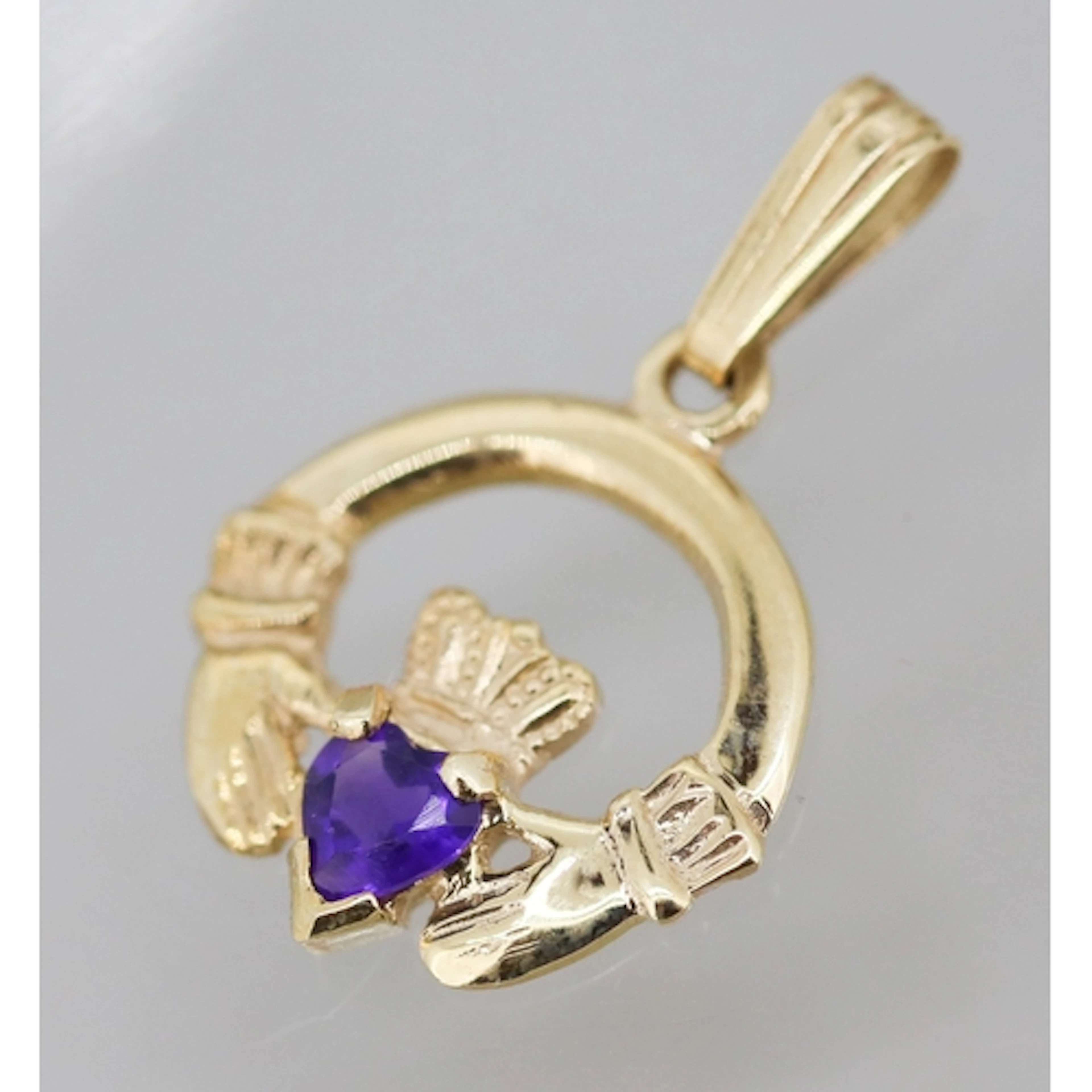 Amethyst Set Claddagh Motif Pendant Mounted in 10 Carat Yell...