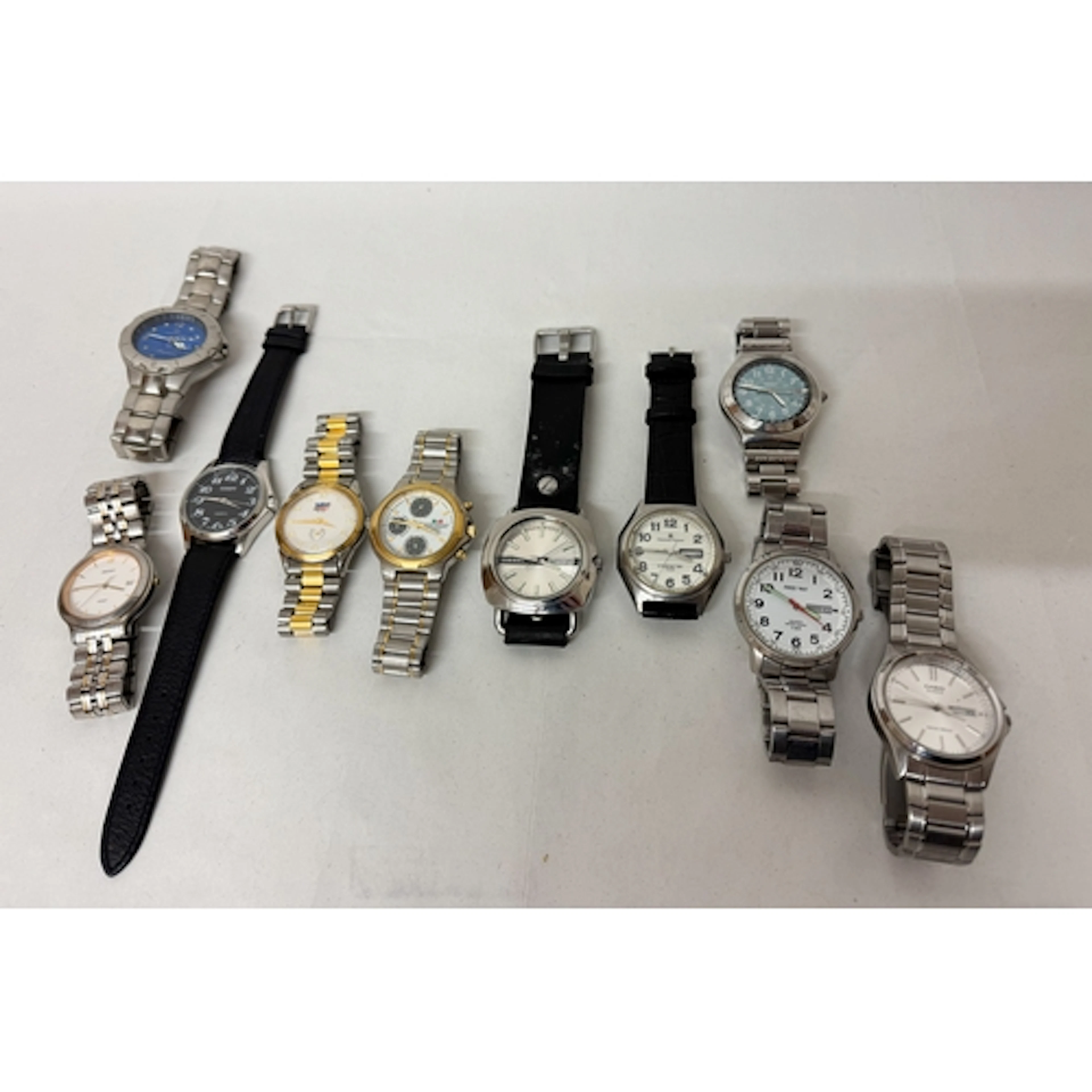 A collection of ten gent's modern dress watches to include D...
