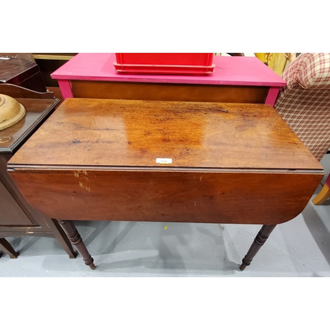 A mahogany dropleaf Pembroke Table fitted single drawer rais...