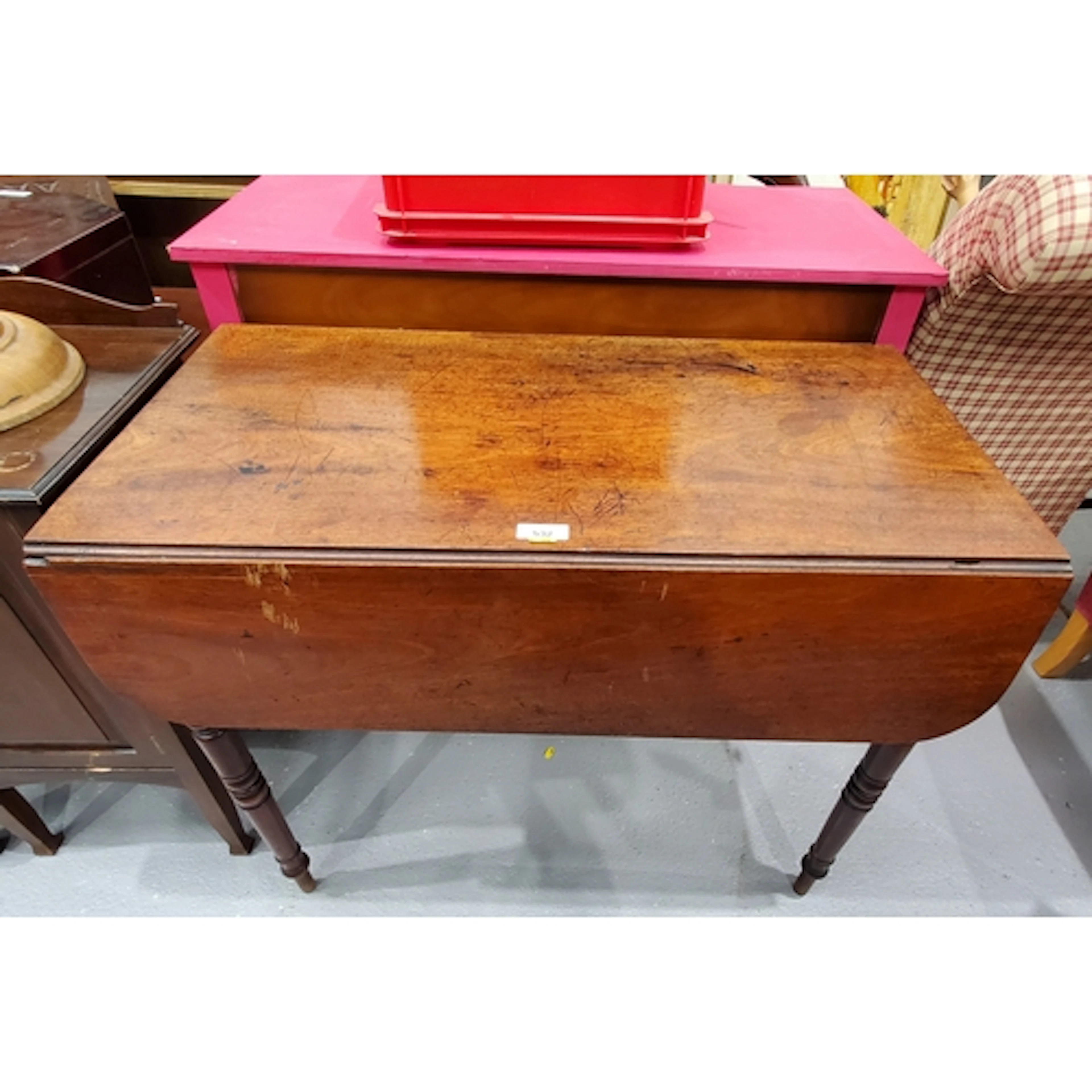 A mahogany dropleaf Pembroke Table fitted single drawer rais...