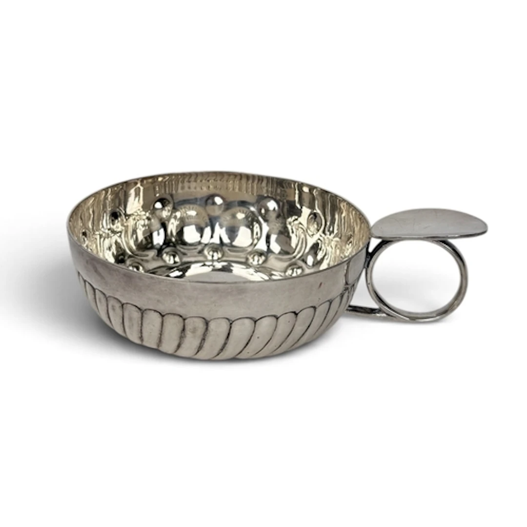 A SILVER PLATED OR SILVER WINE TASTING CUP To be checked. We...