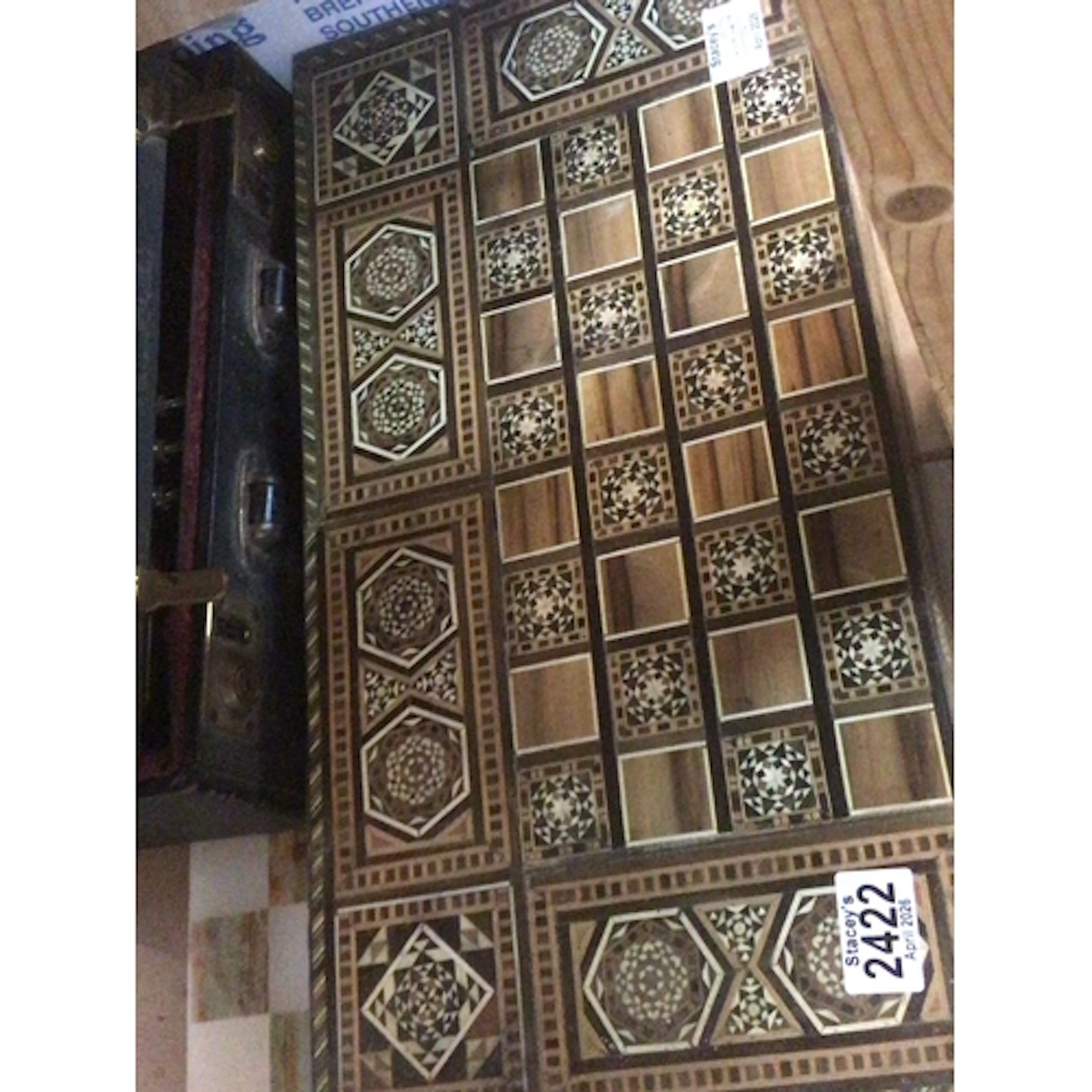 A Syrian Moorish inlaid Games box and an onyx games board (2...