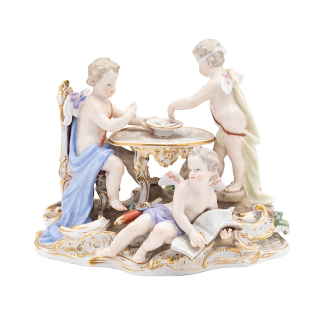 A Meissen group of the Bindfolded Cupid with two putti, late...