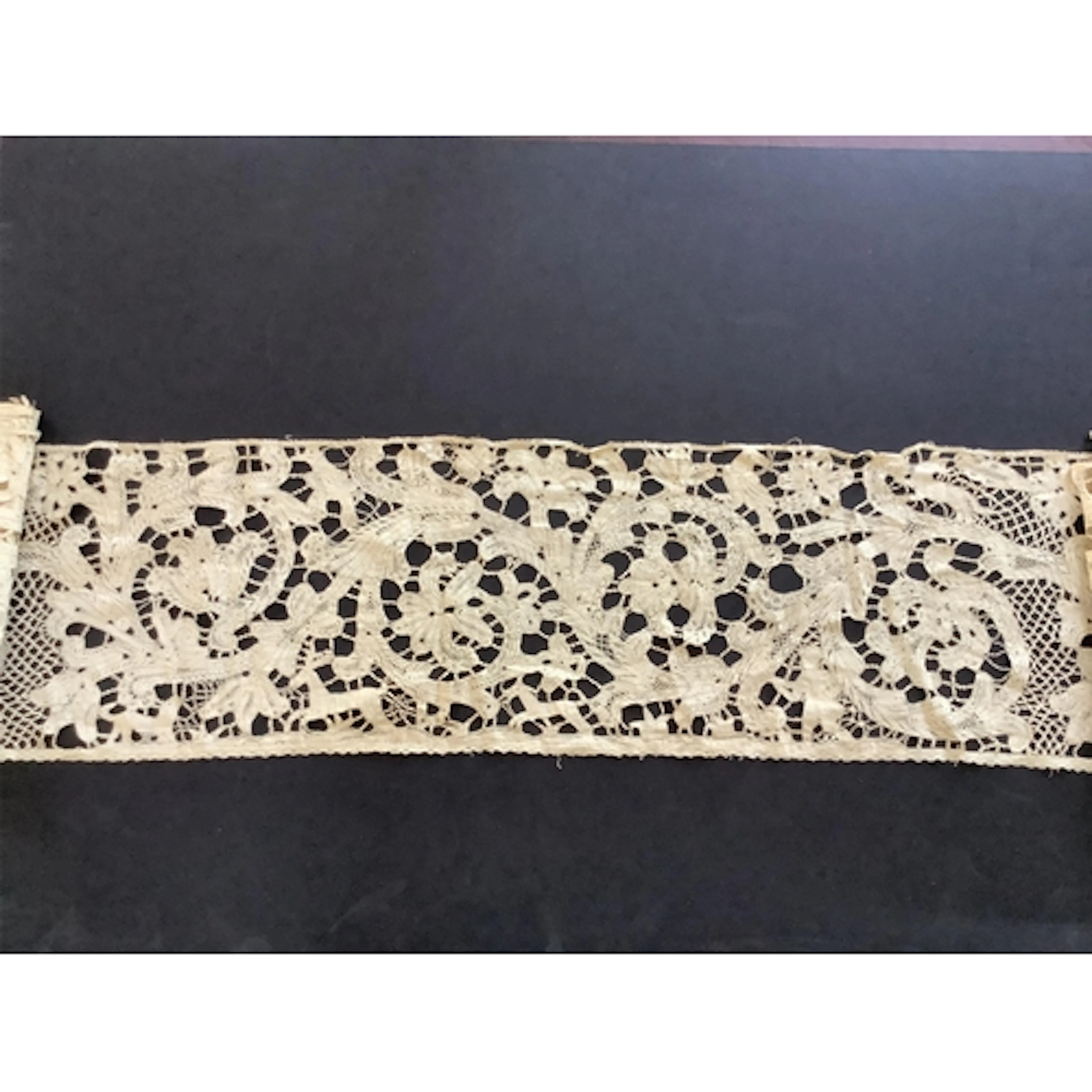 A rare handmade Italian Milanese lace flounce. Made in the s...