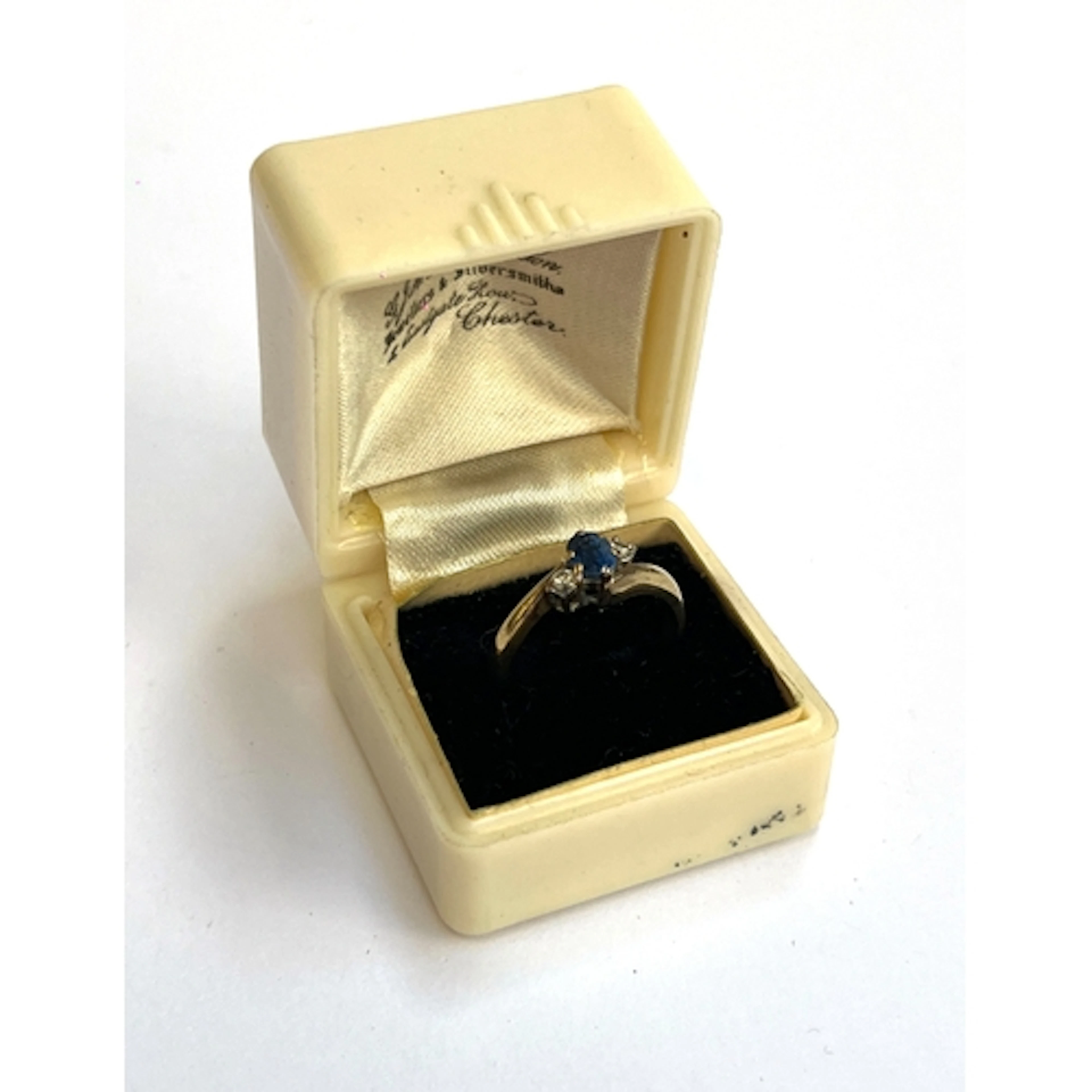 An 18ct gold, sapphire and diamond trilogy ring, the sapphir...