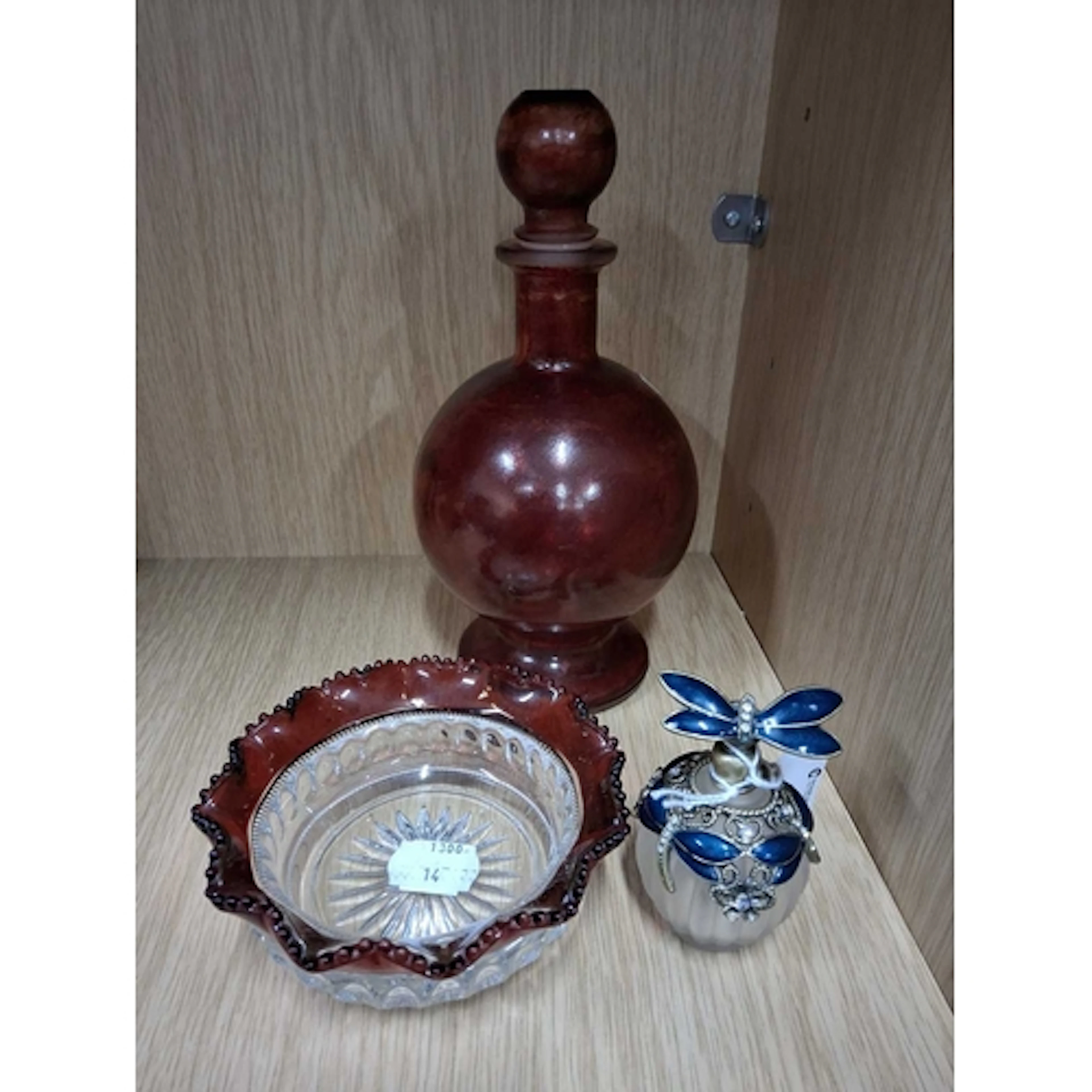 A GROUP OF GLASSWARE, comprising a moulded bottle painted wi...