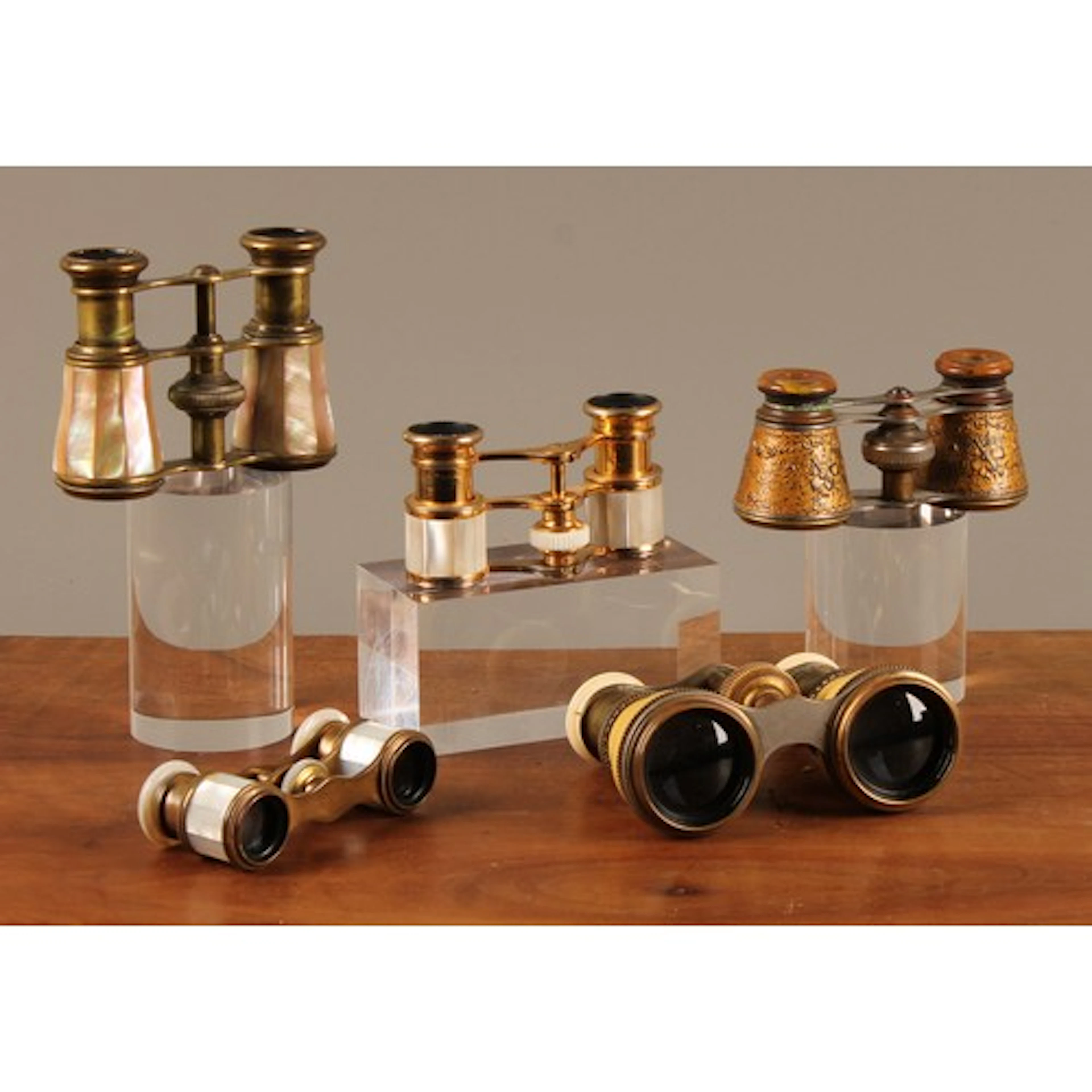 A pair of 19th century Bakelite and brass mounted opera glas...