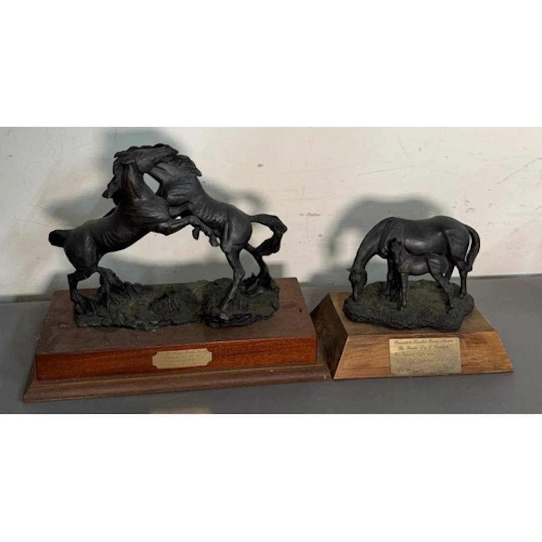 Horse racing interest. Two horse racing trophies presented t...