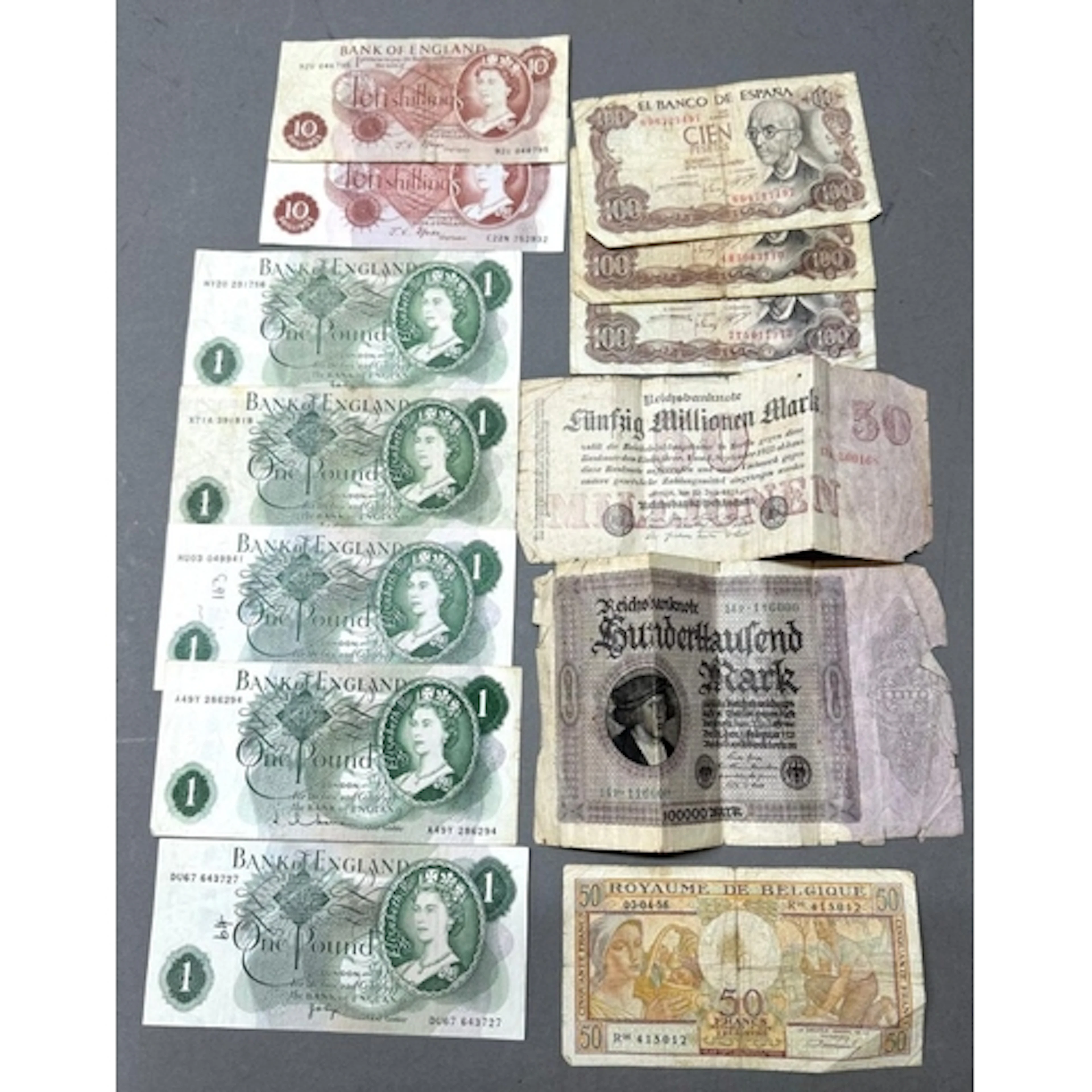 A selection of banknotes to include: Five x £1 notes, Two x ...