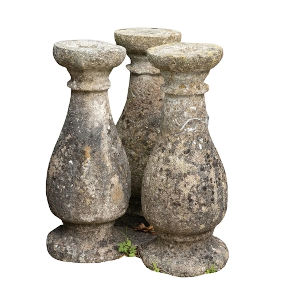 A set of three stone composition balusters, early 20th centu...