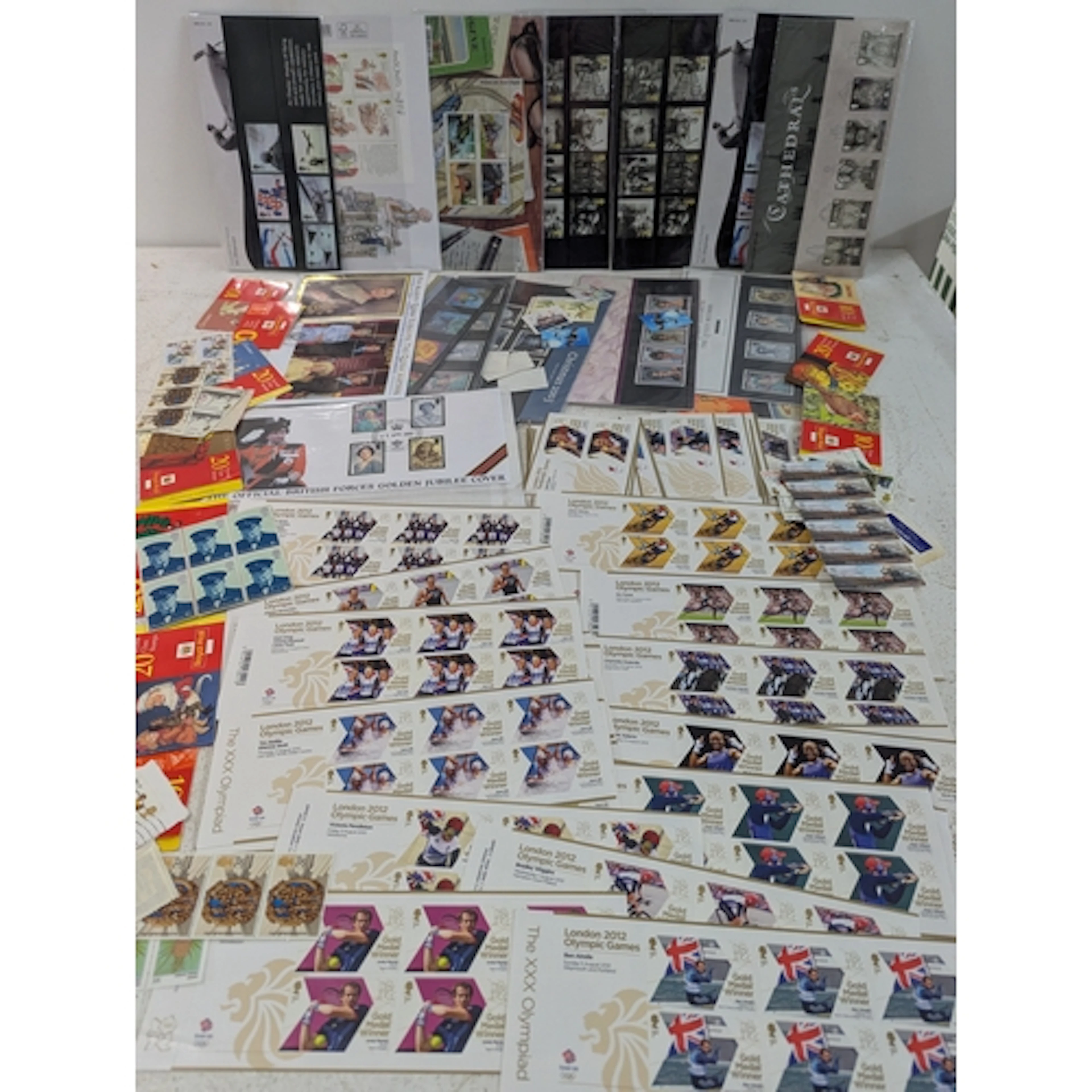 A collection of stamps to include a London 2012 Olympic Game...