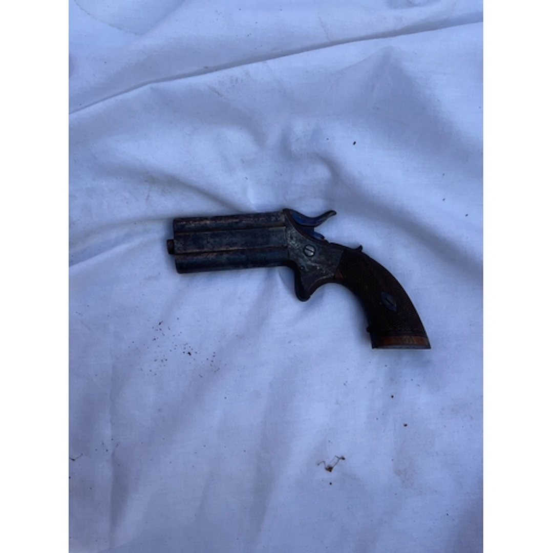 Woodwards .32 cal swivel over under Deringer. Obsolete calib...