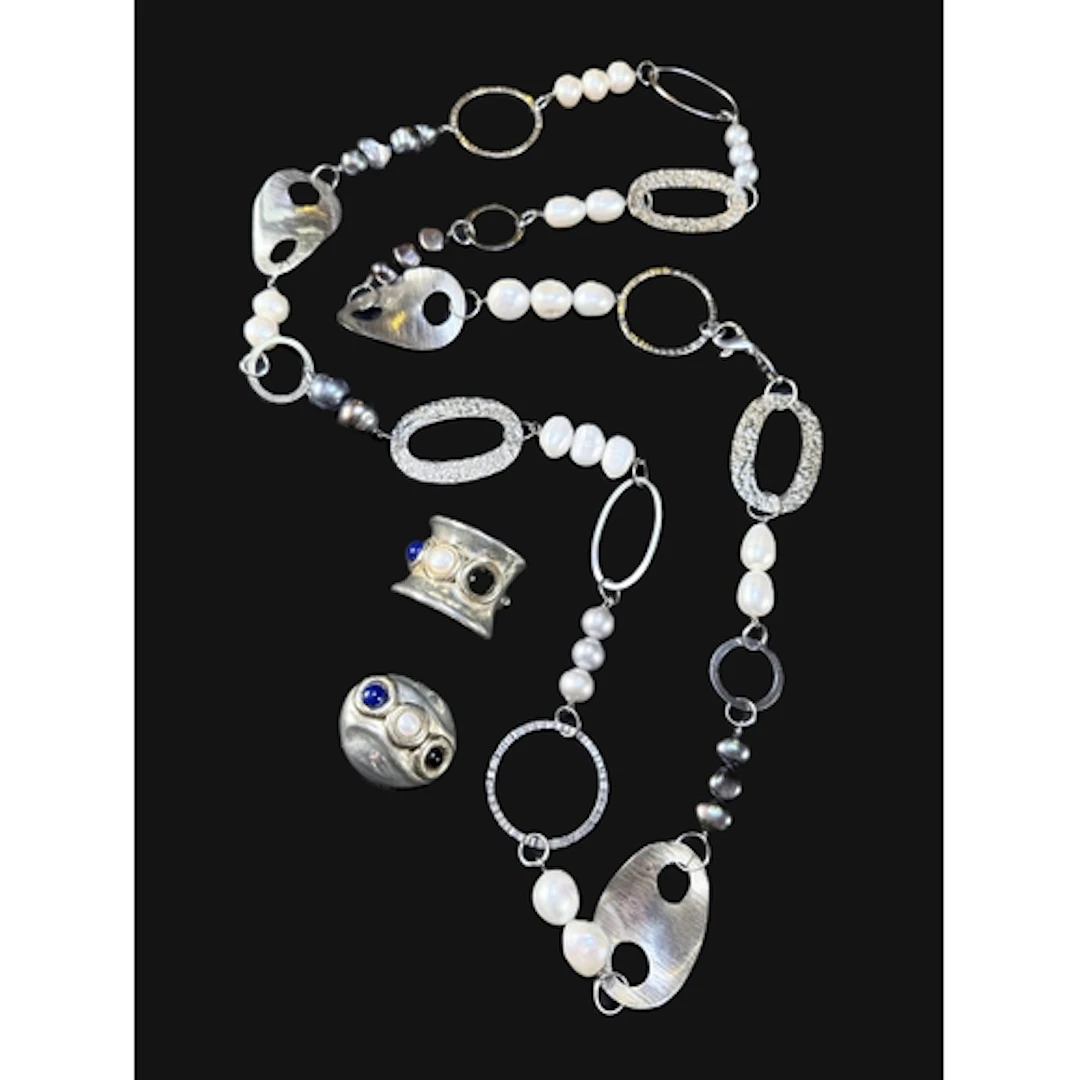 A 1990's Austrian silver and freshwater white, grey and blac...
