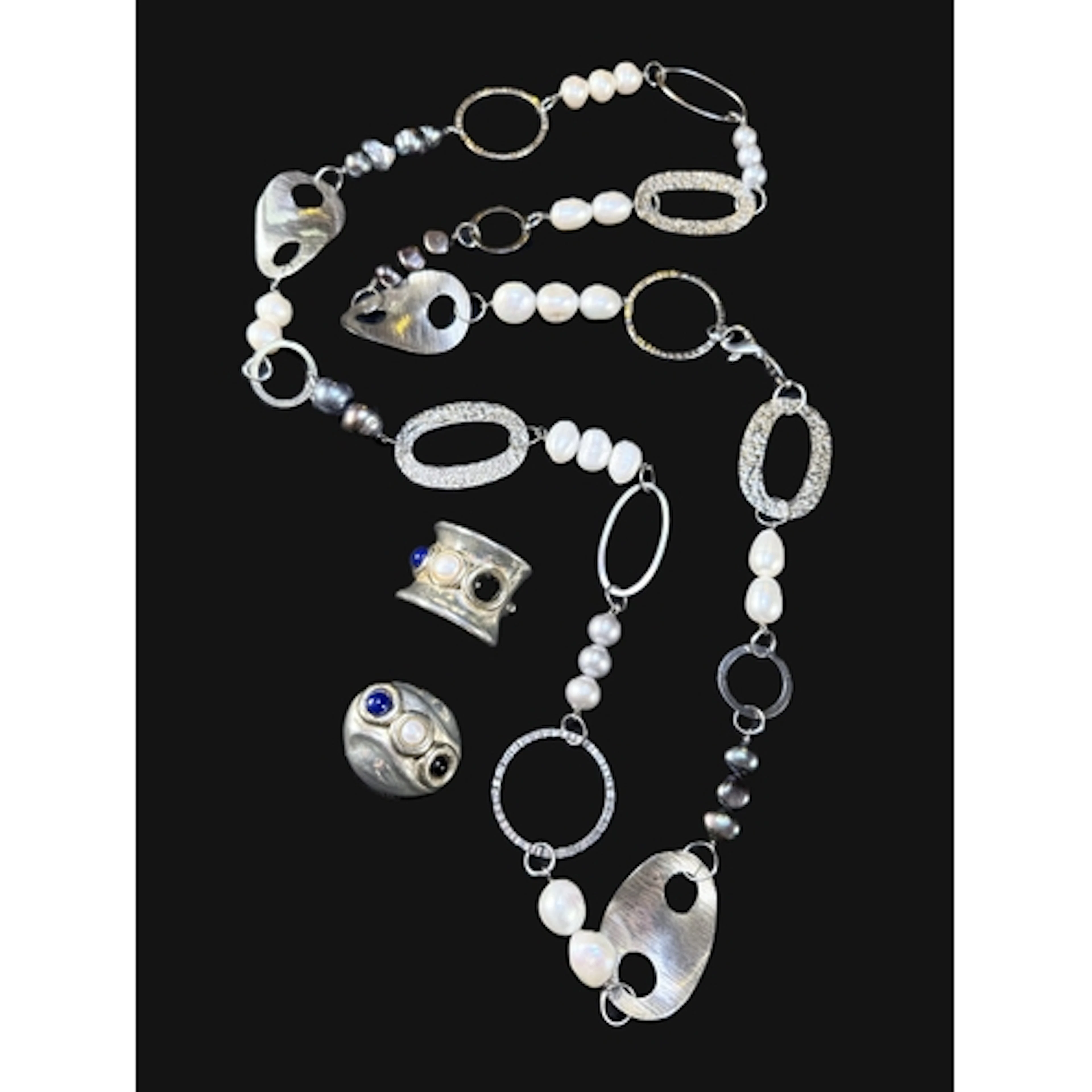 A 1990's Austrian silver and freshwater white, grey and blac...