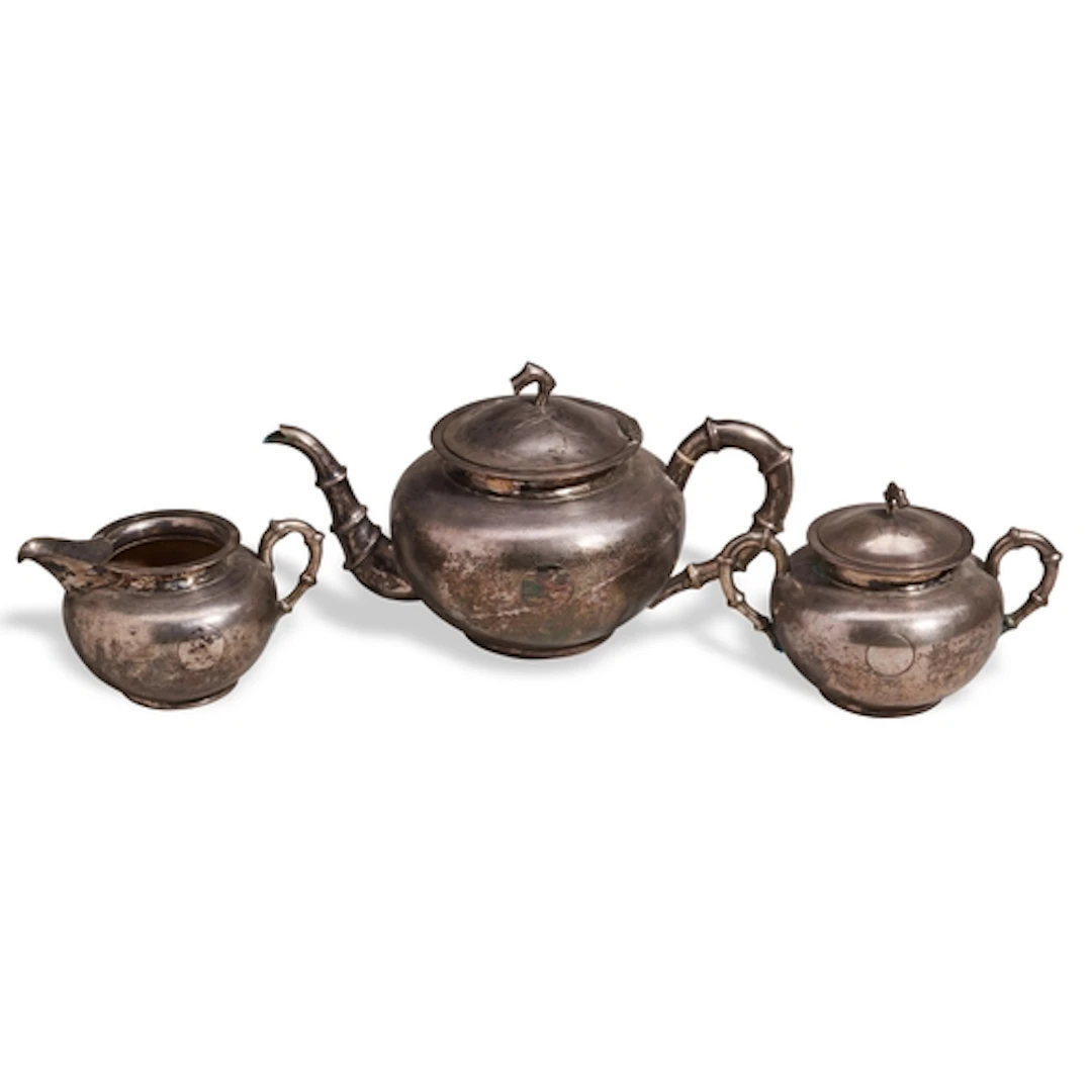 A CHINESE EXPORT THREE-PIECE SILVER TEA SERVICE, LATE QING ...