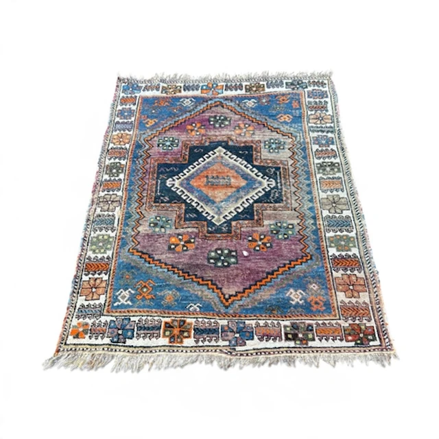 A TURKISH CARPET 195cm x 140cm