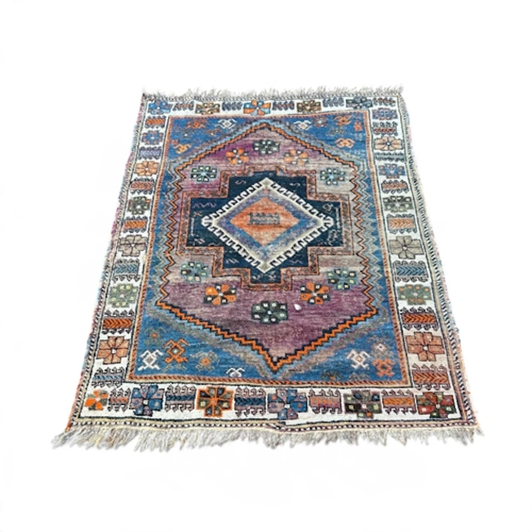 A TURKISH CARPET 195cm x 140cm
