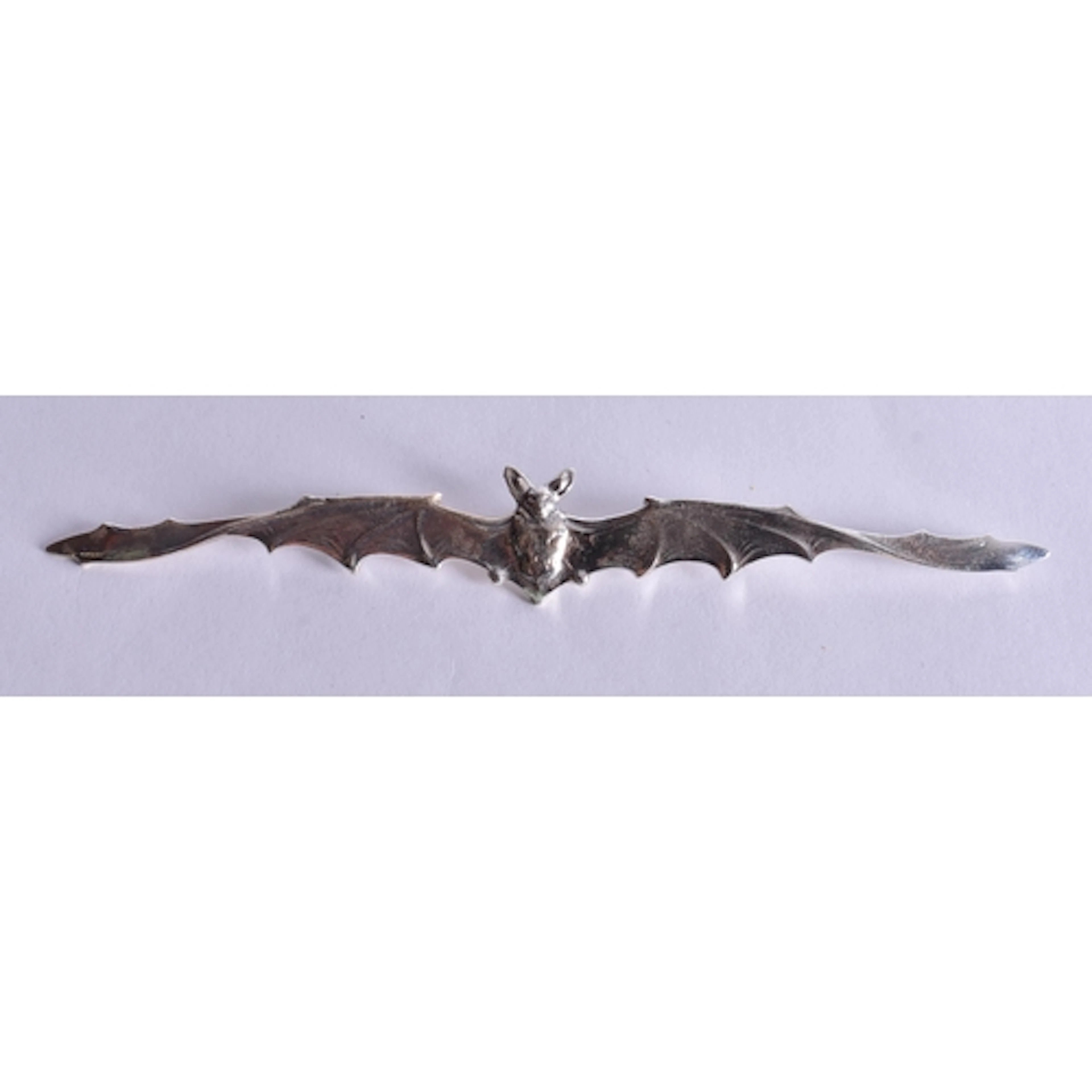 A Silver Bat Brooch. Stamped Sterling. 11.6cm x 1.6cm, wei...