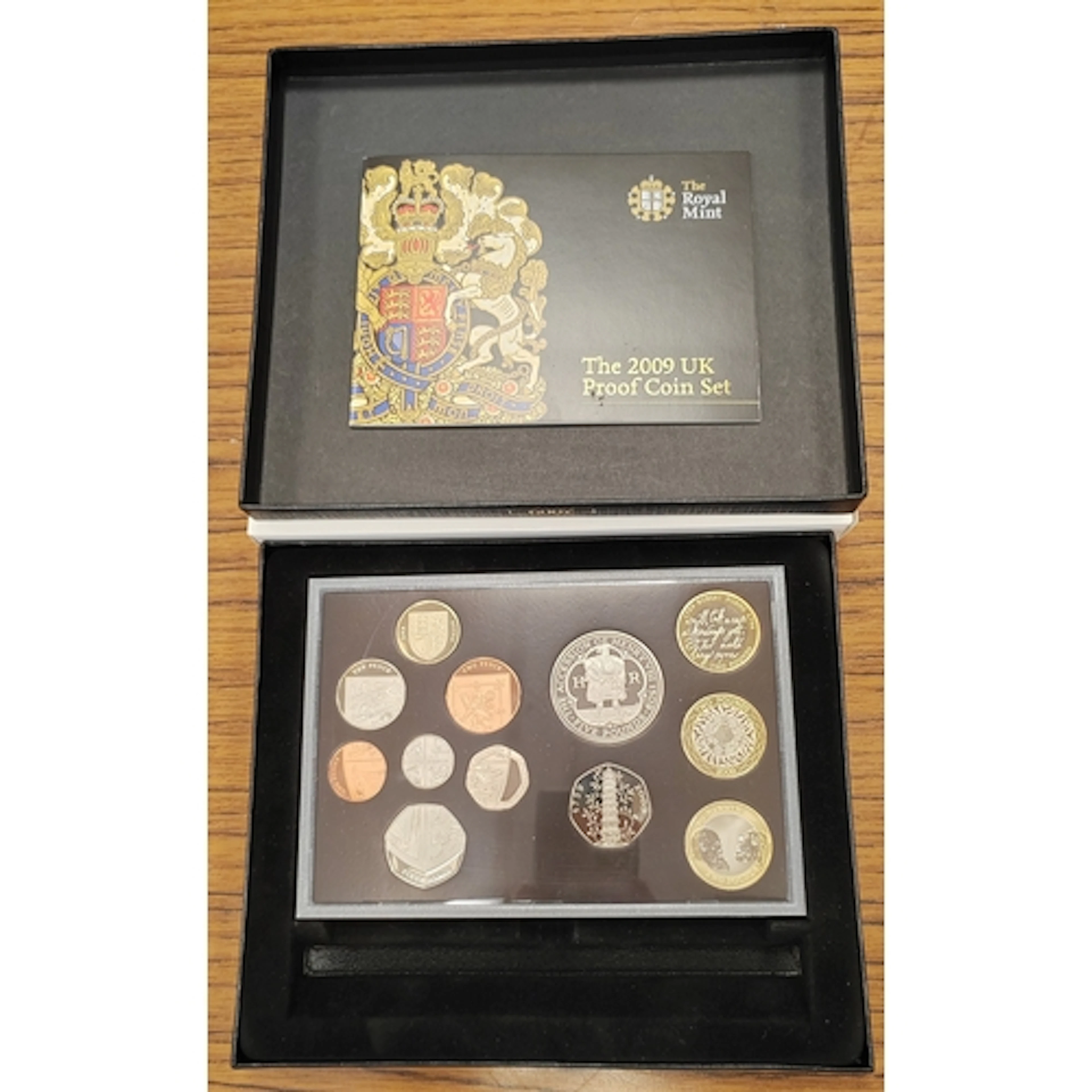2009 proof cased set of 12 FDC, includes 2009 50p Kew Garden...