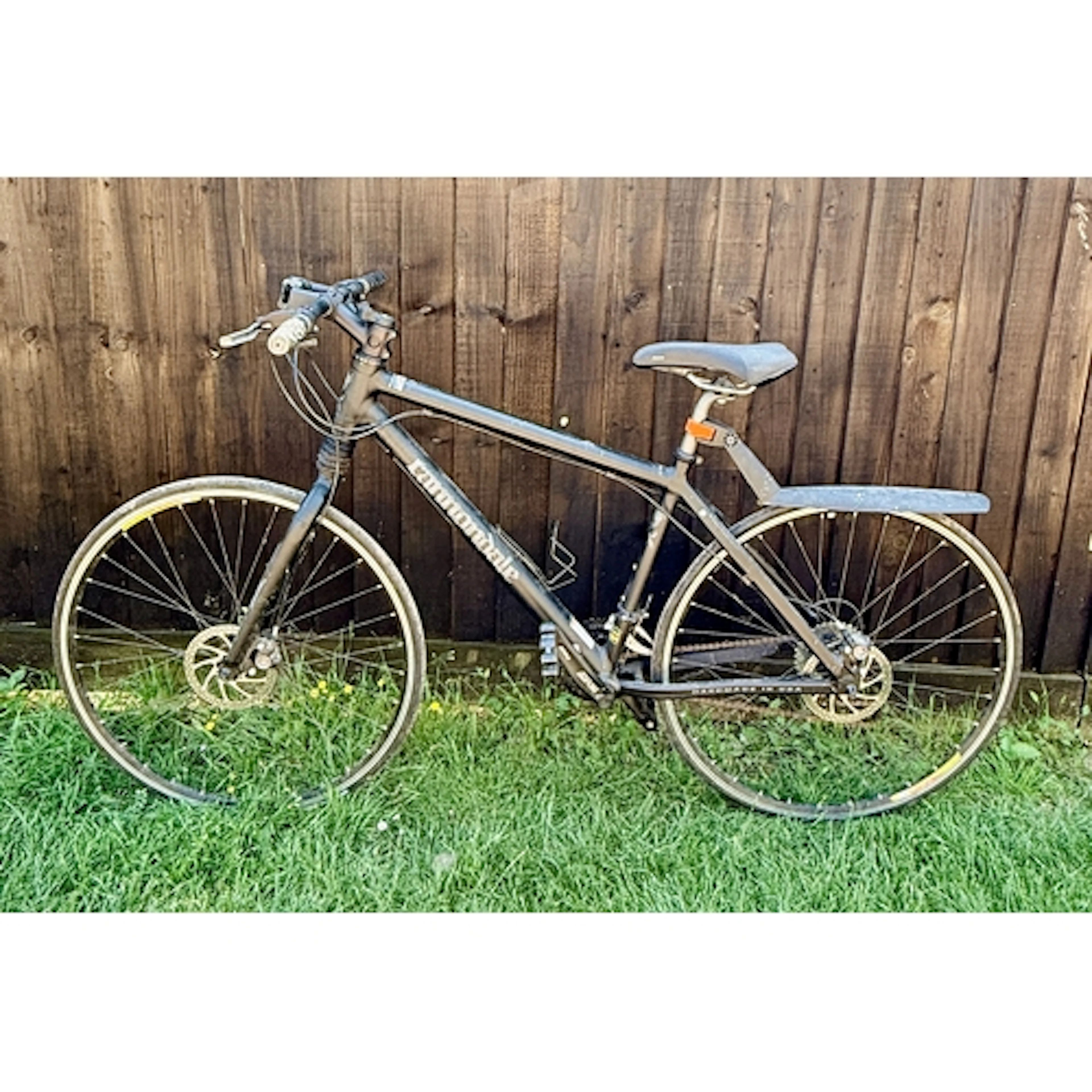 A Cannondale hybrid bike - with Ultra Headshok front suspens...