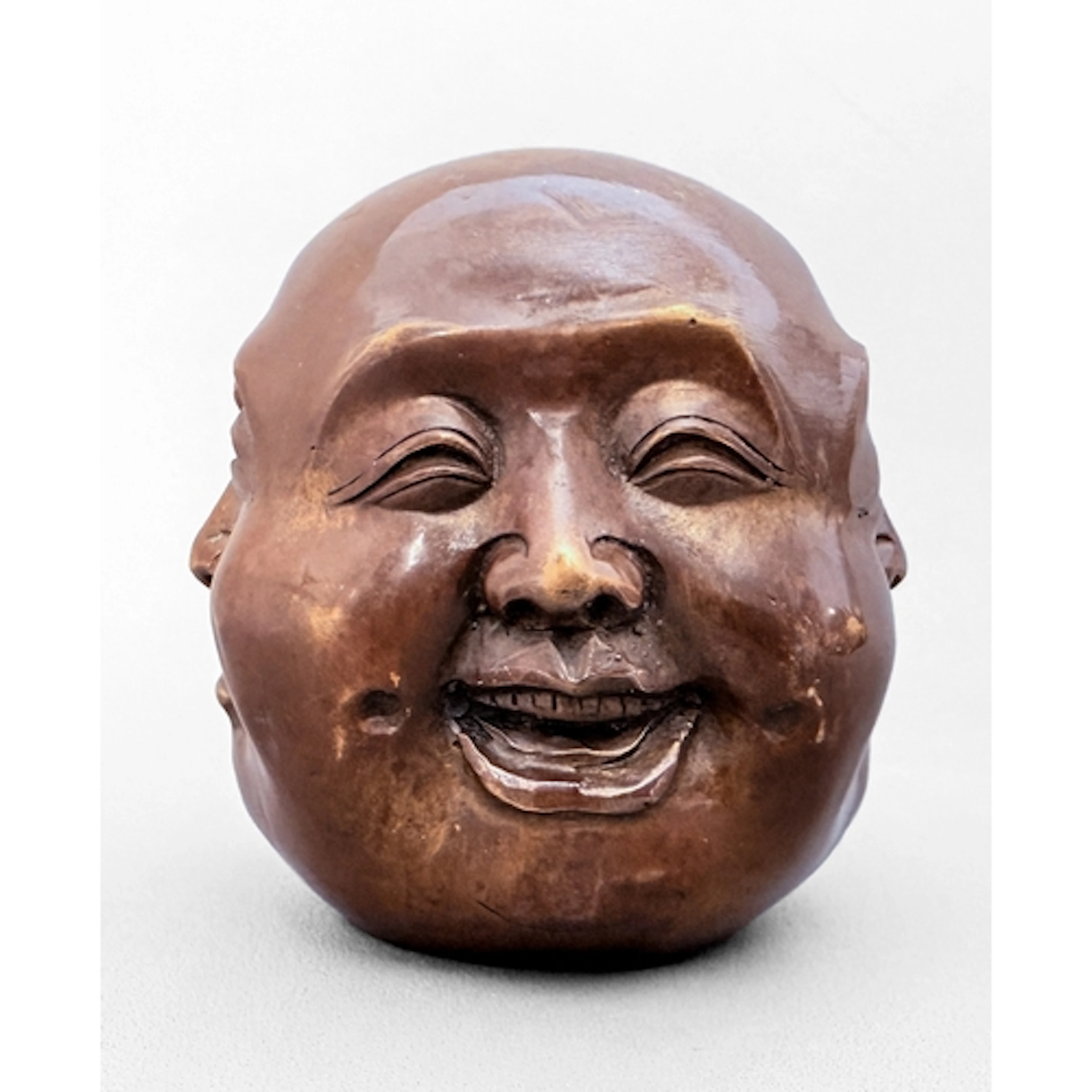 A contemporary cast bronze four faces of Buddha paperweight ...