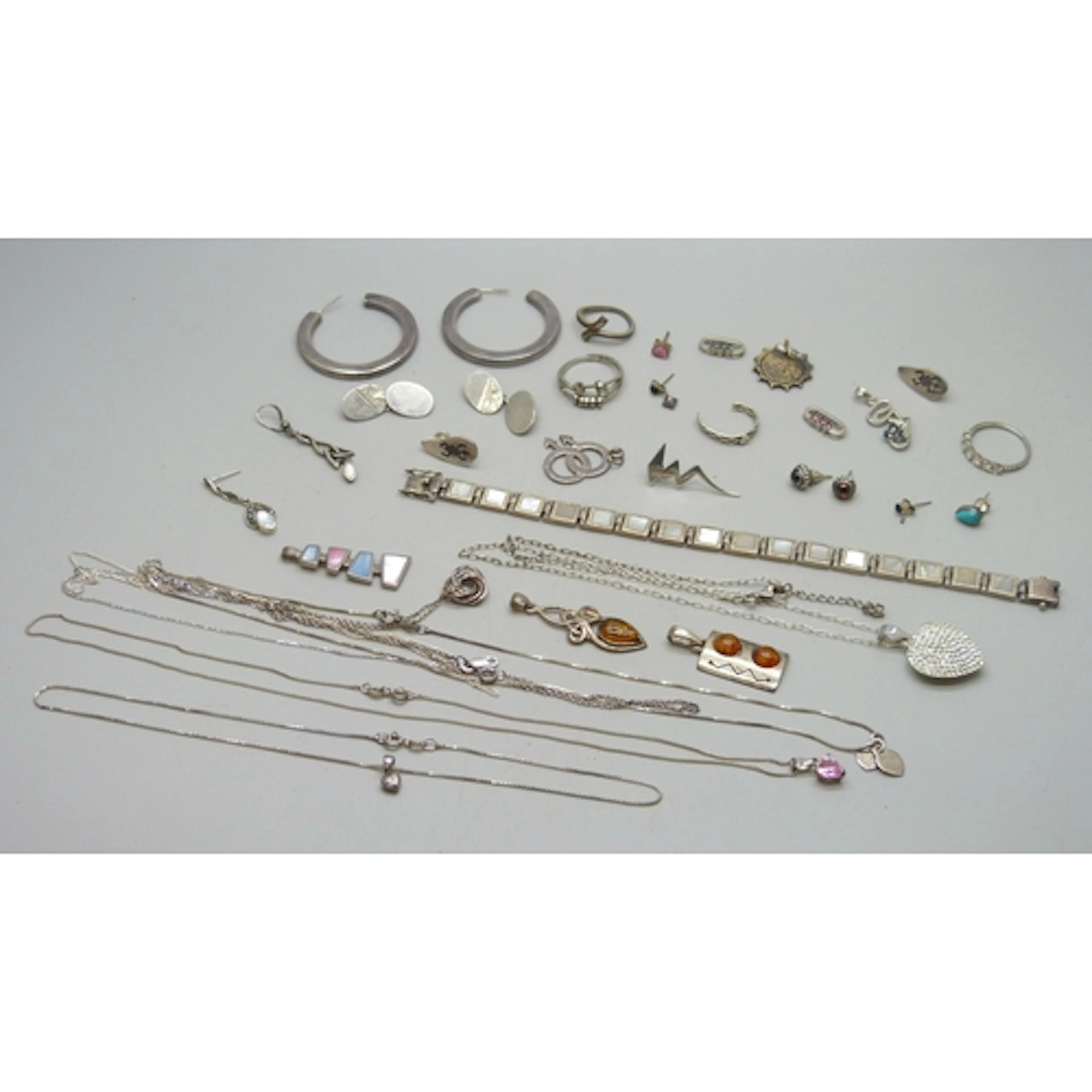A collection of silver and white metal jewellery, a few plat...