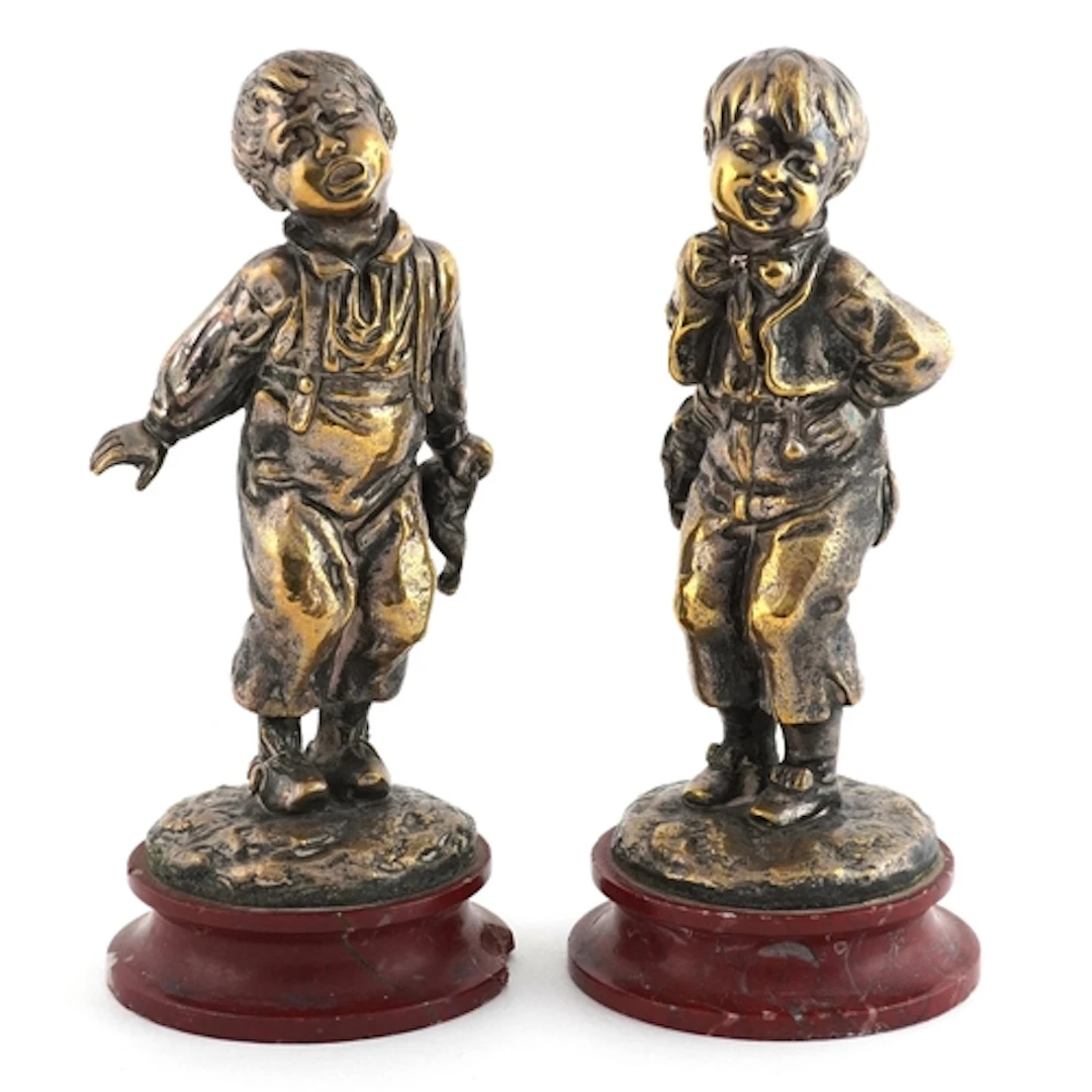 After Louis Kley, pair of silver plated bronze figures of yo...