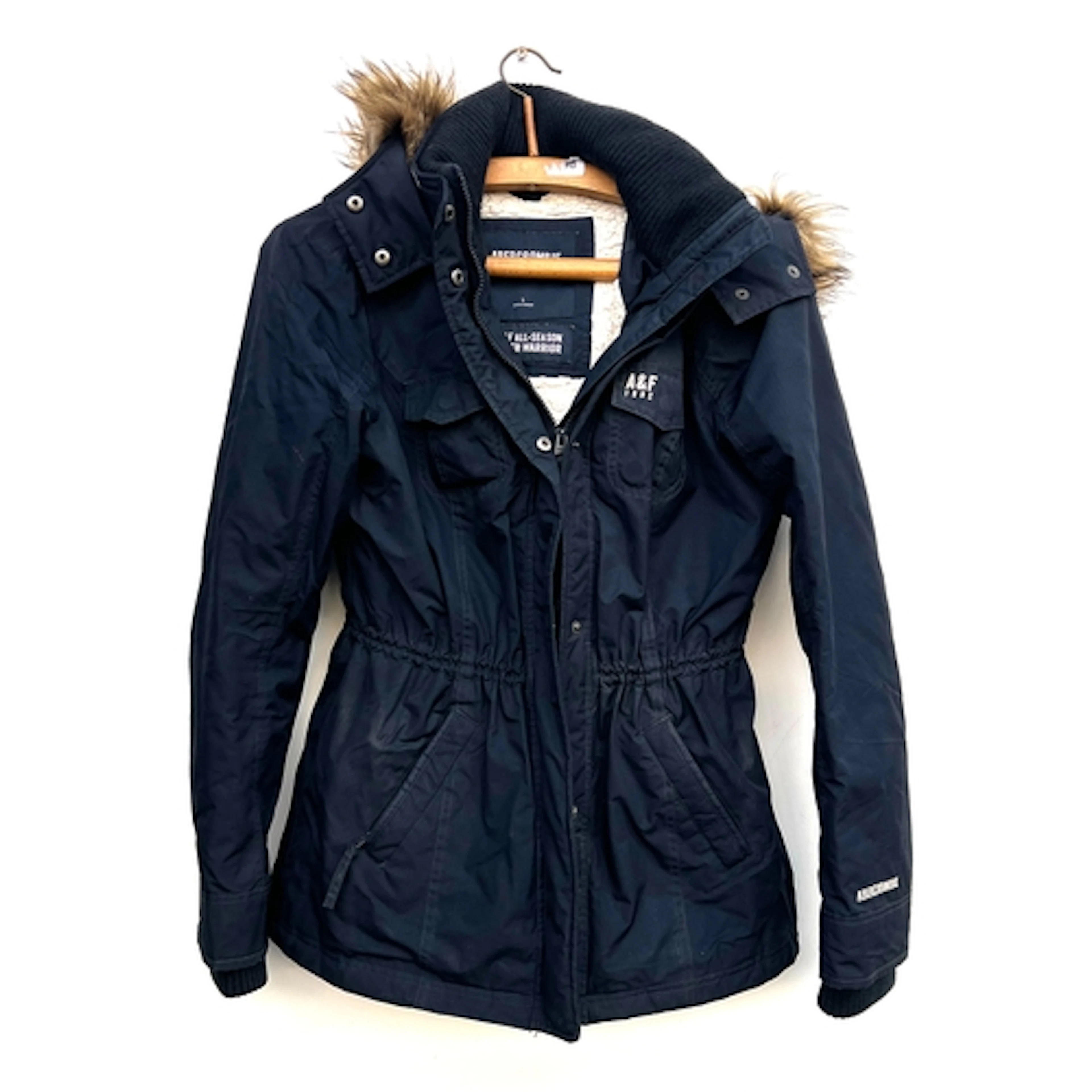 An Abercrombie parka coat with faux fur lined hood, size L